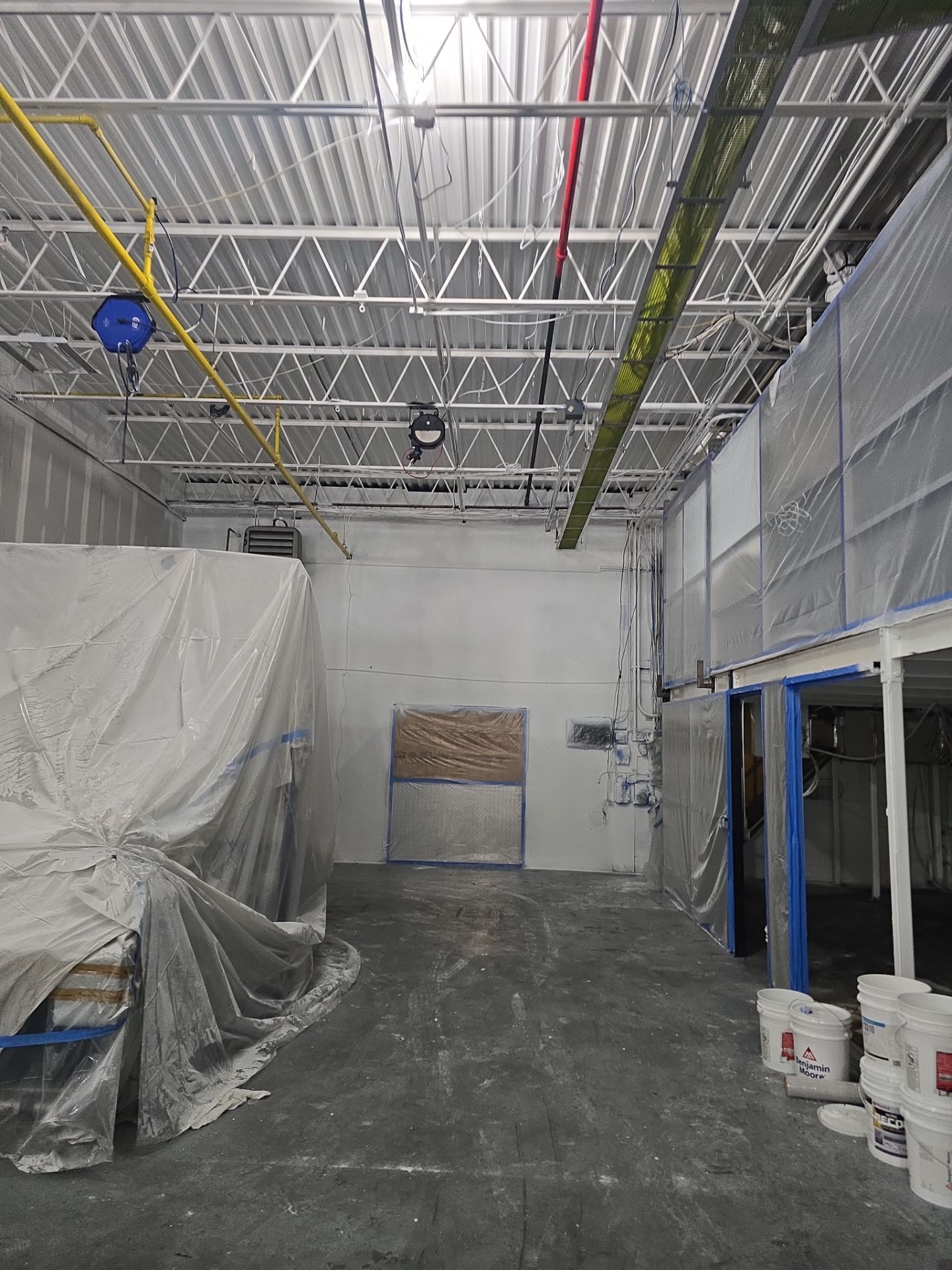 Industrial Warehouse Fire Damage Cleaning and Spray Sealing in Islandia by EMS Restoration Corp