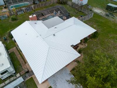 White Standing Seam Metal Roof Replacement and Hurricane Reinforcement in Palm Bay, Florida