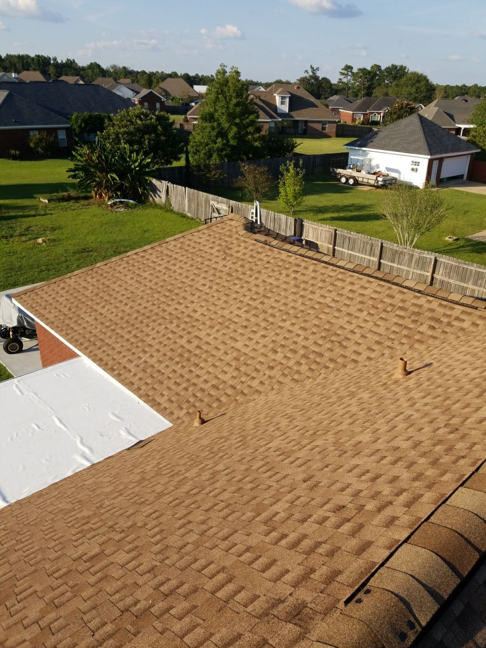 Residential Roofing Installation using Roof Replacement by American Roofing & Construction LLC