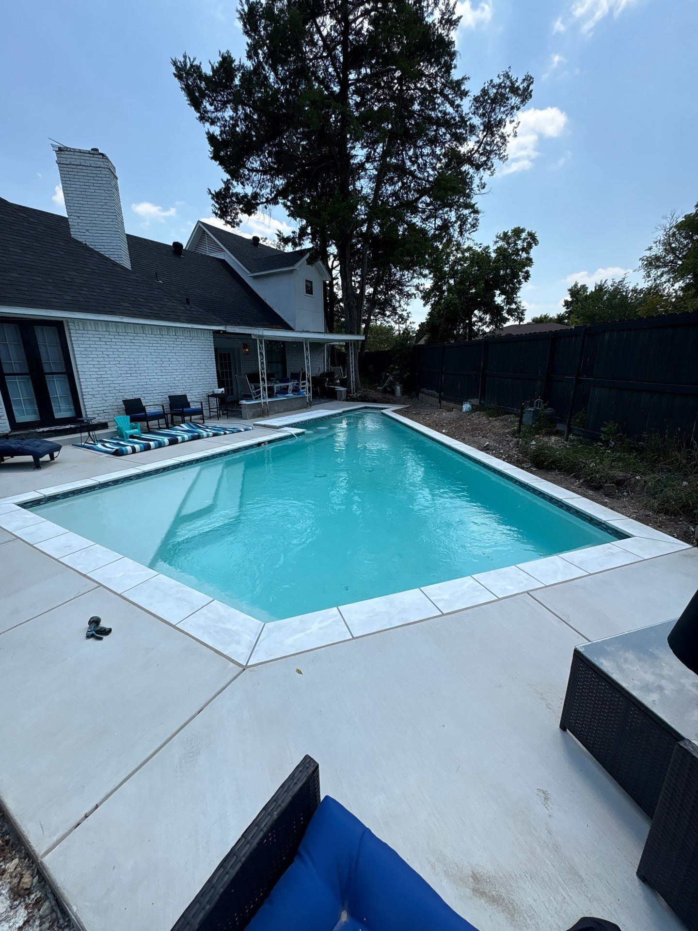 Modern Geometric Pool with Tanning Ledge by Pinnacle Pools and Spas - DFW