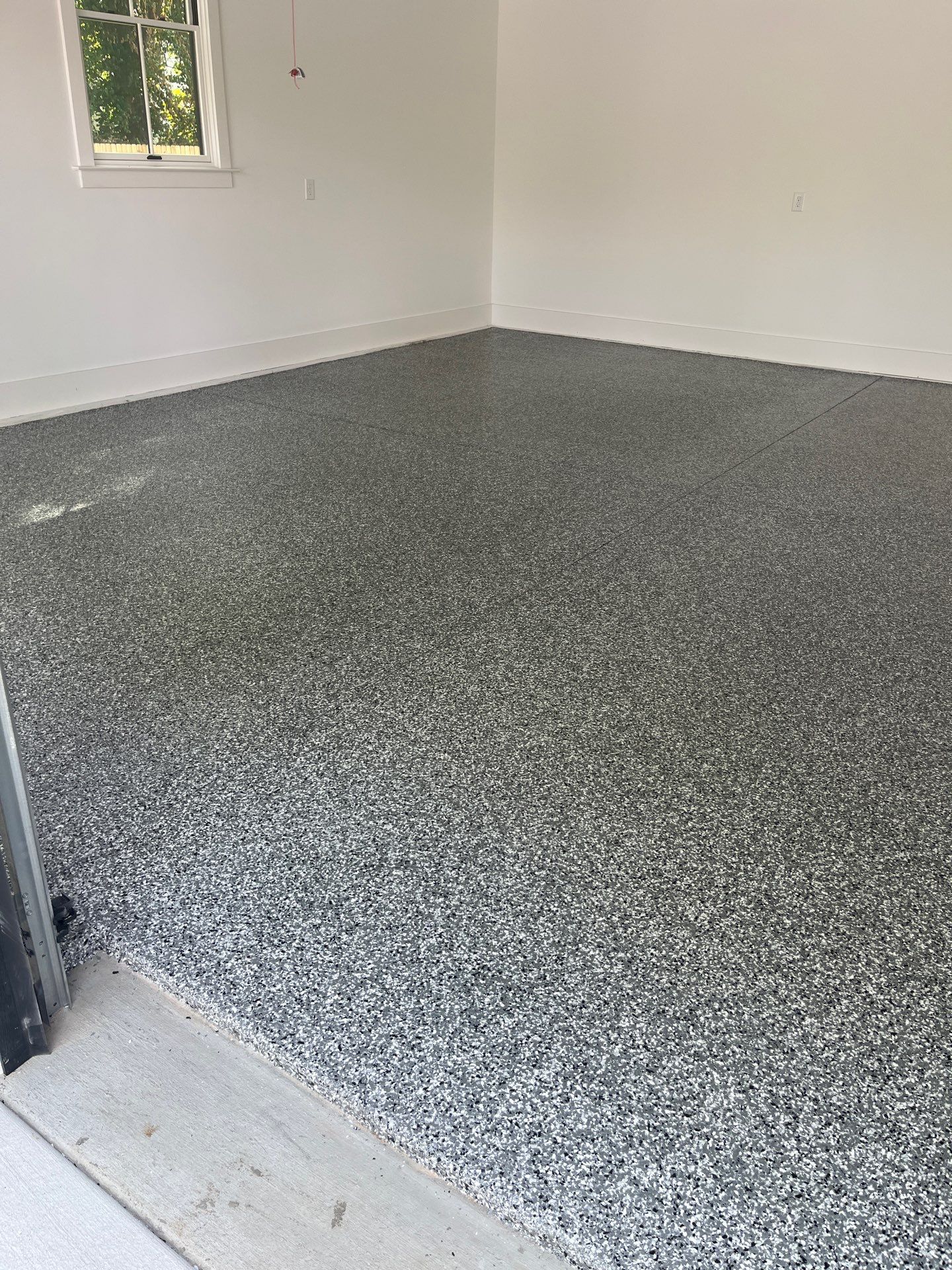 Garage Floor Coating using Wombat by My Garage Floor Guys
