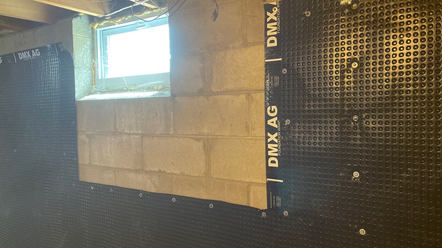 Interior Drain Tile & Buried Discharge in South Minneapolis by Waterproofing Northeast