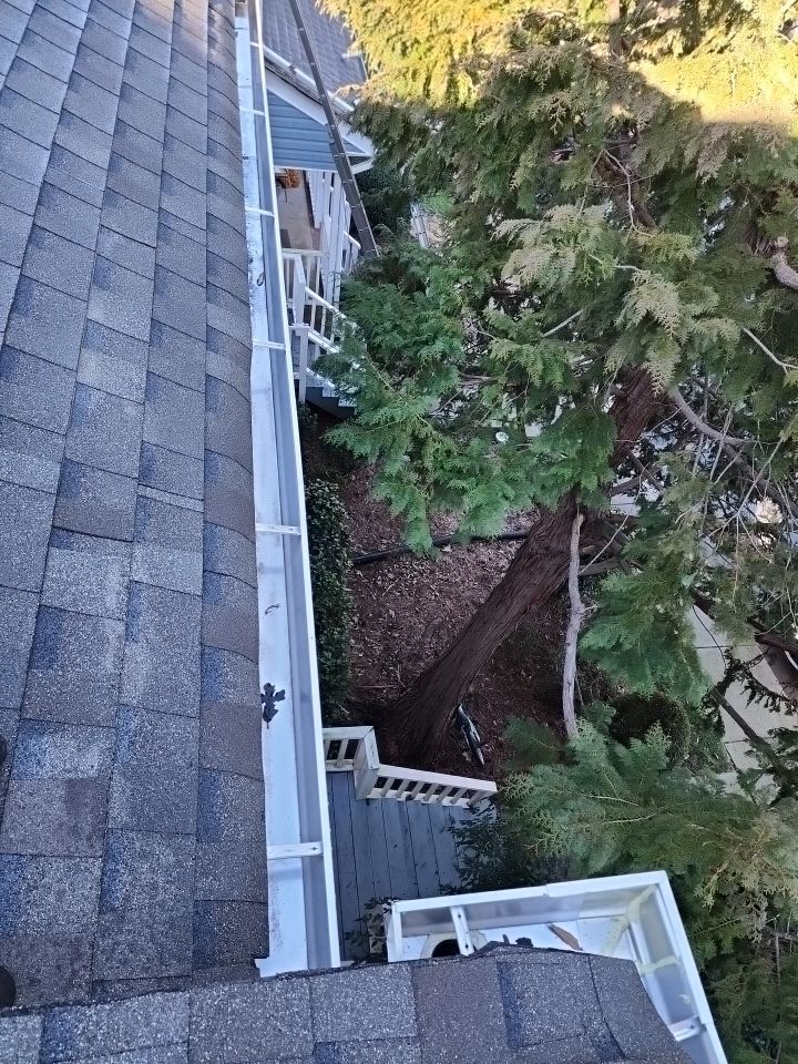 Gutter Cleaning using water by Power Wash Masters LLC