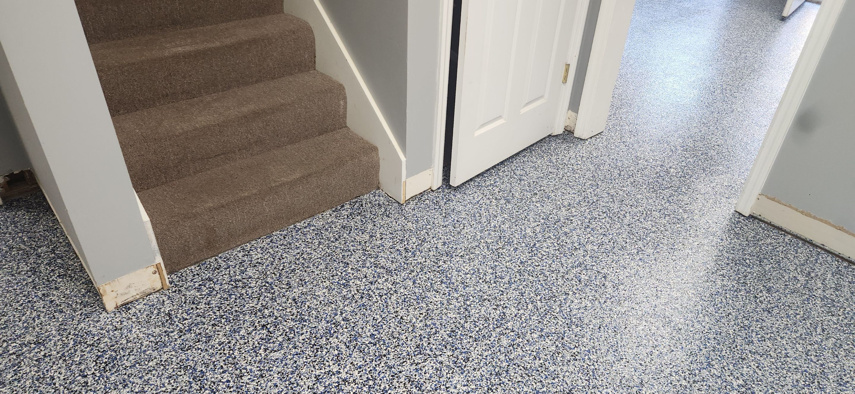 Basement using Denim by Elite Floor Solutions