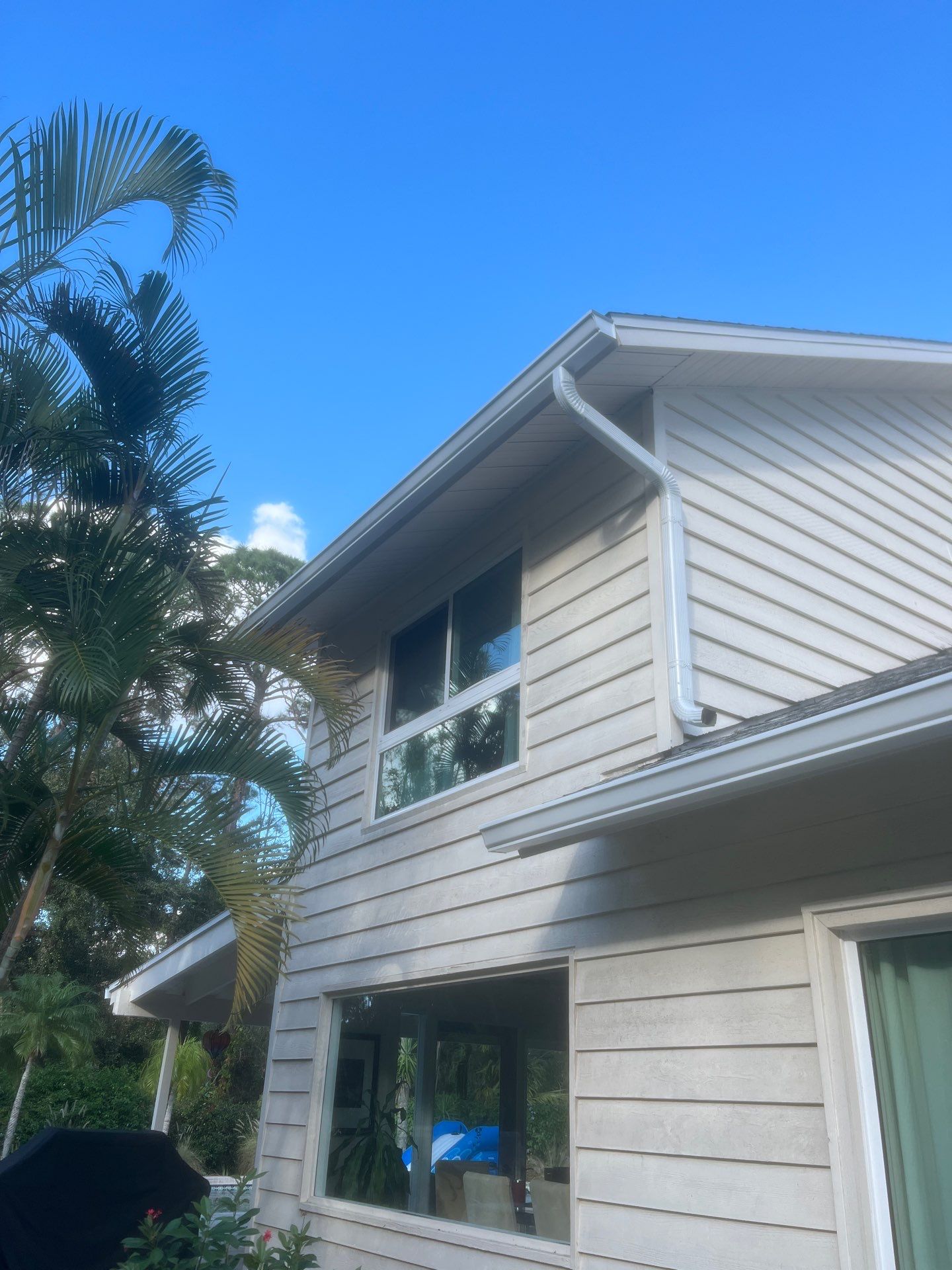 White 6-Inch Seamless Gutters Installation in Sarasota FL by Gutter Professors