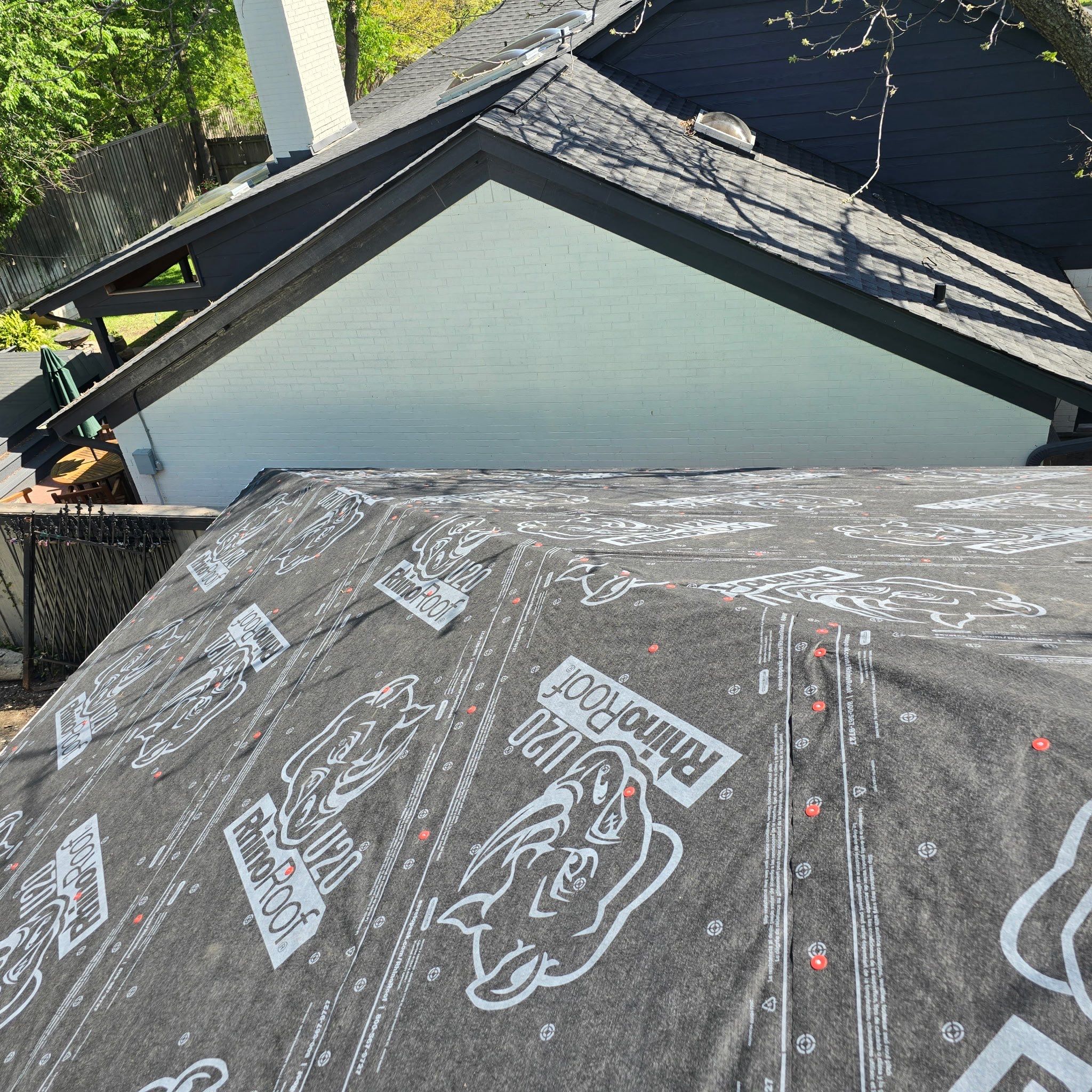 Home Addition Roof Install in Progress by Harvey Roofing & Construction