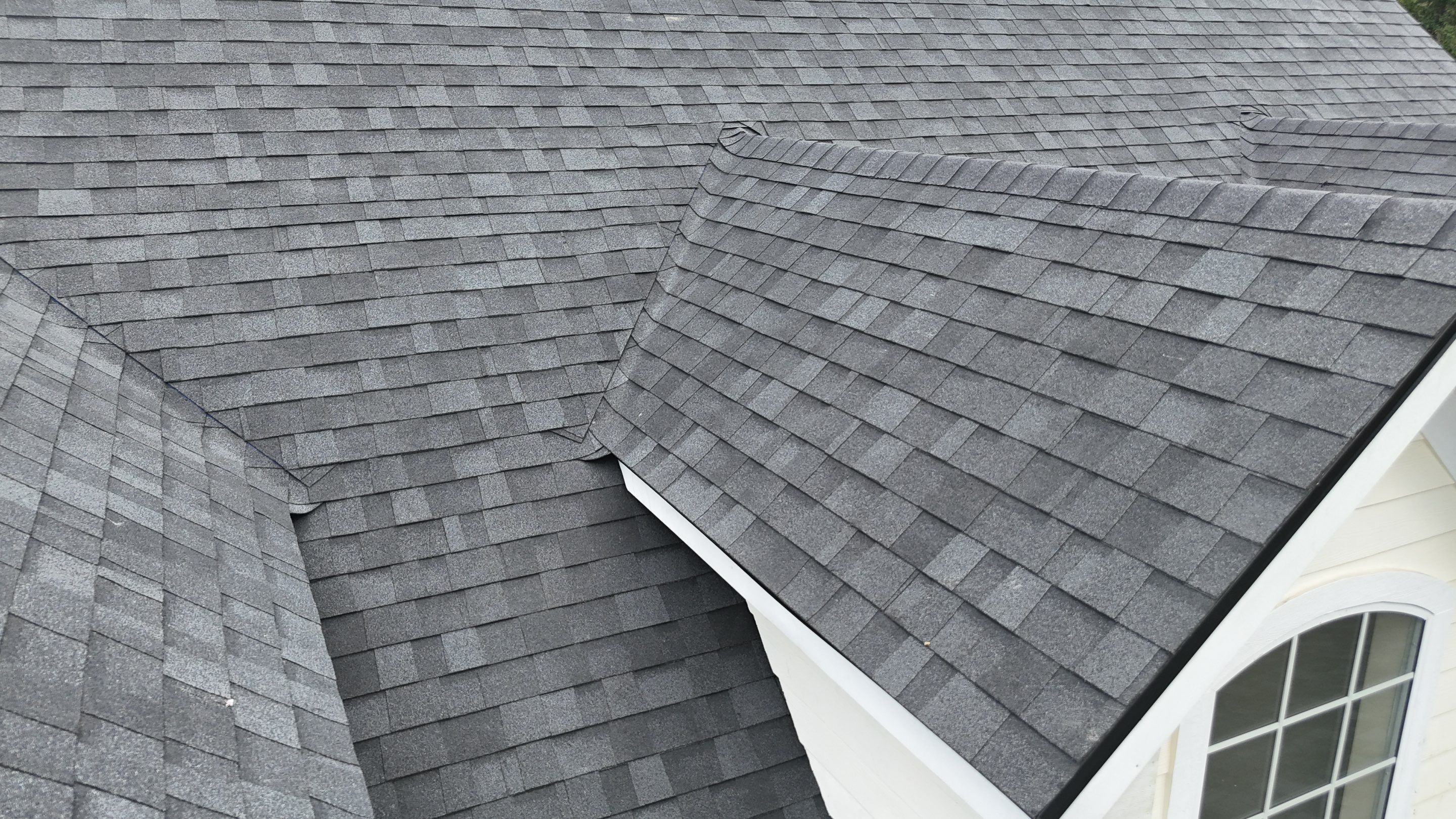 Comprehensive Onyx Black Asphalt Shingle Roof Replacement for Flagler Beach Residence by Trinity Restoration and Roofing LLC