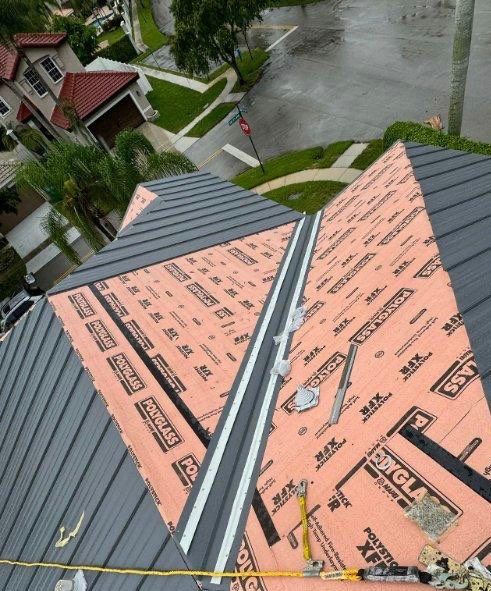 Charcoal Gray Standing Seam by Reimagine Roofing