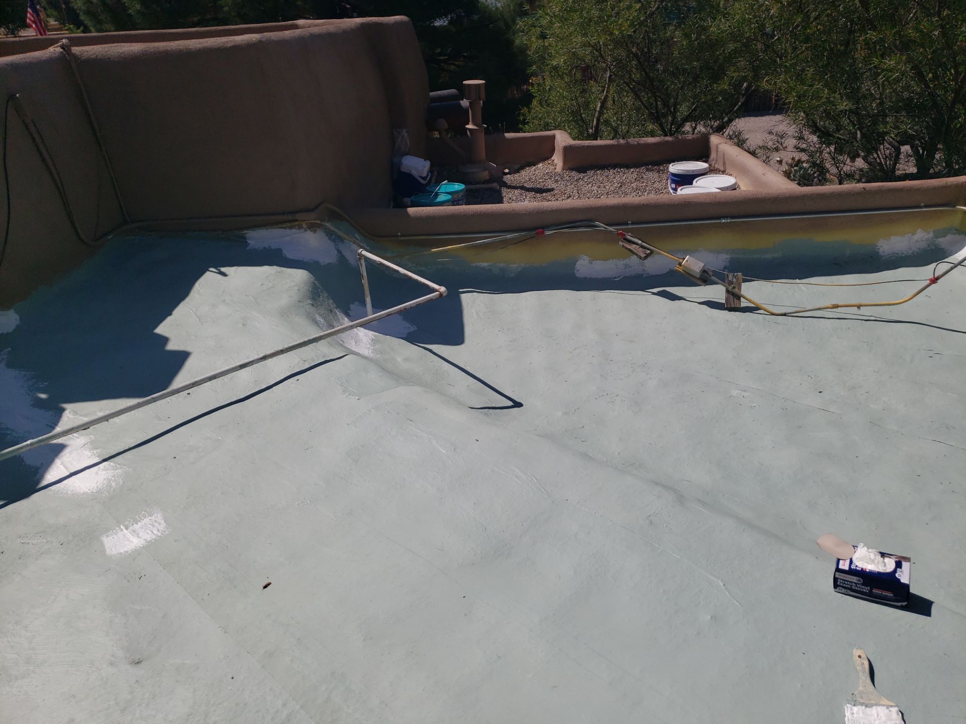 Residential roof application by SPF Services 