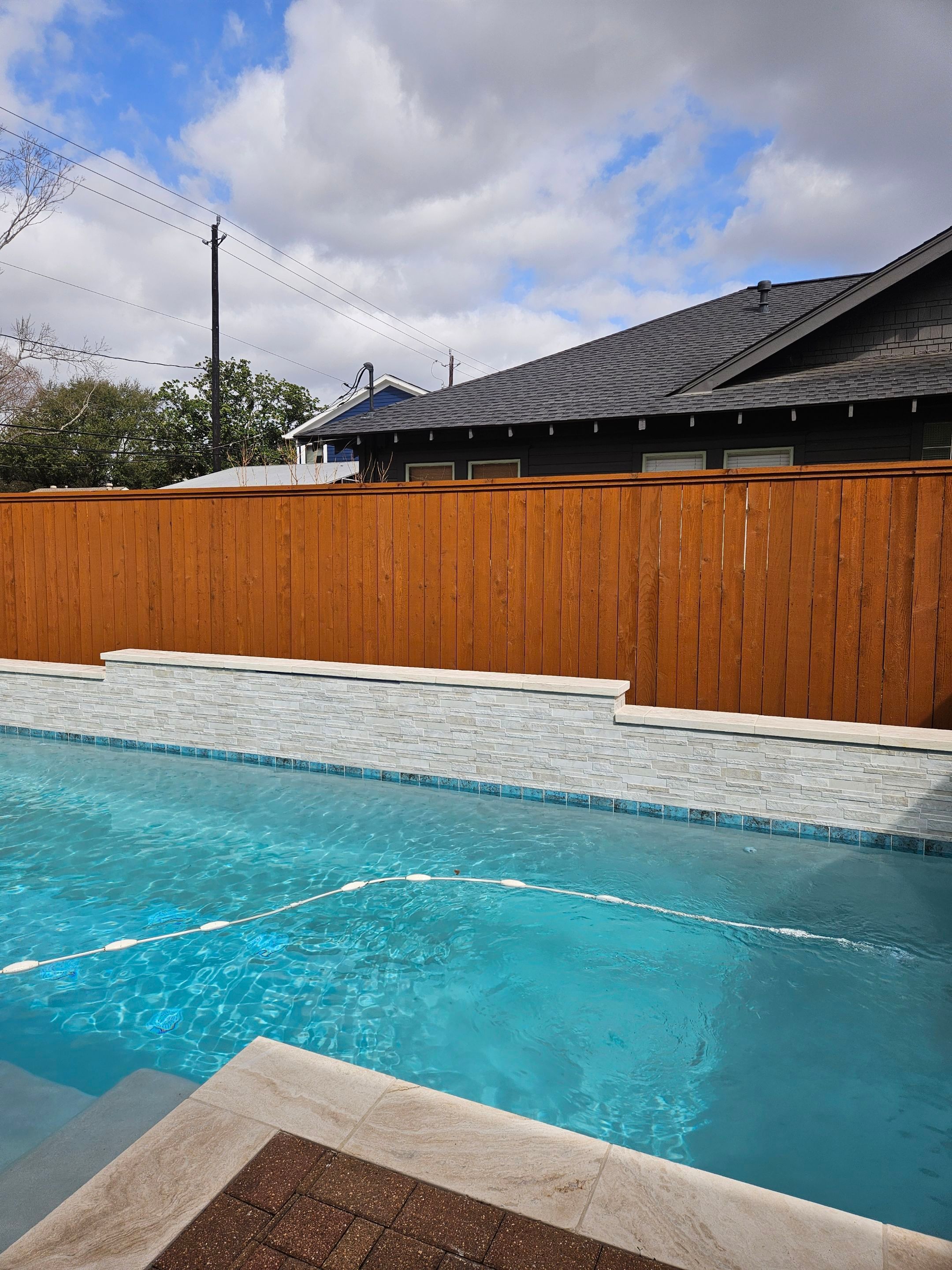 Durable Fence & Gate Installation with Premium Stain by Tim's Fences