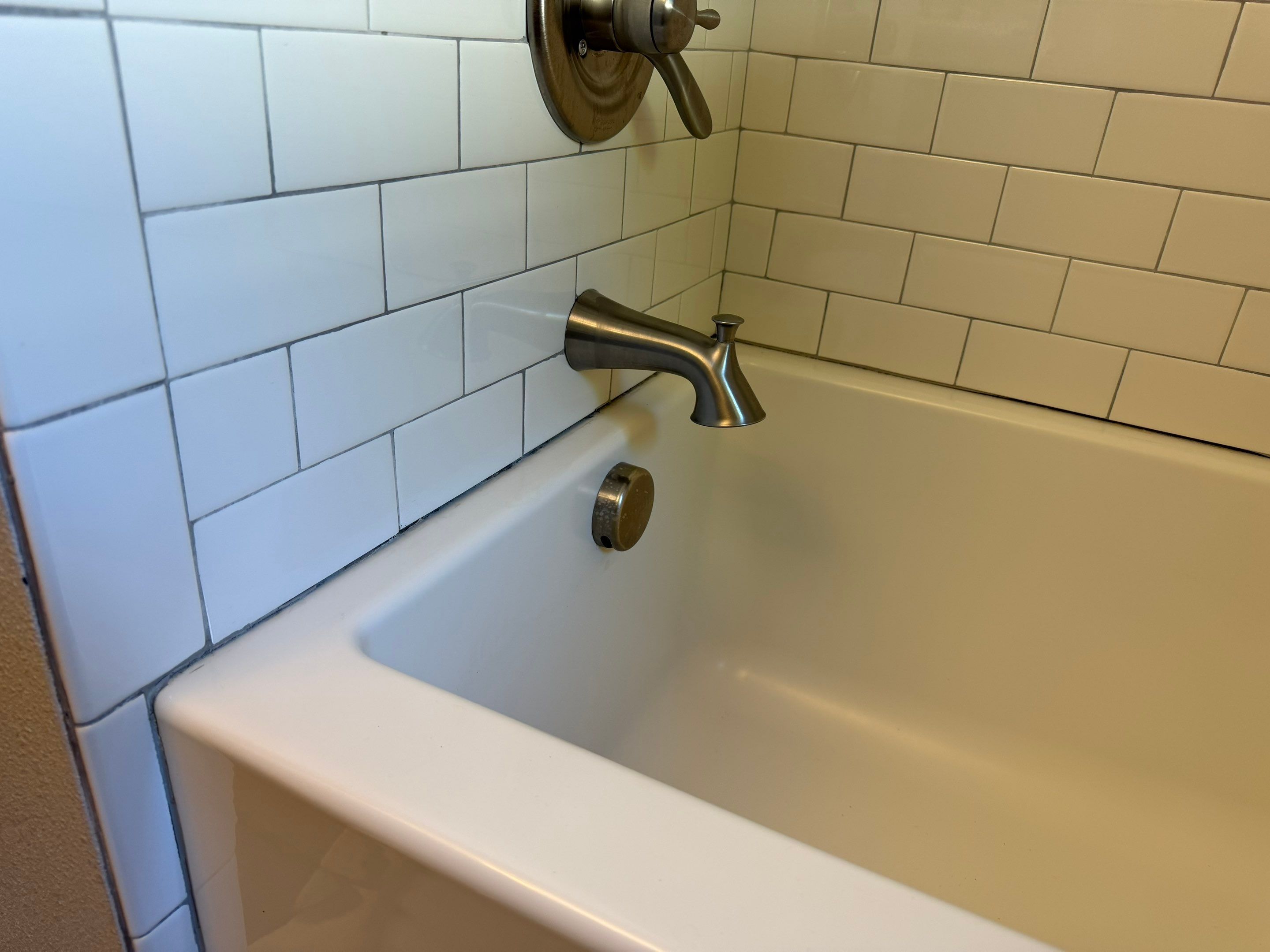Bathtub Caulking Sealing by Handyman State LLC