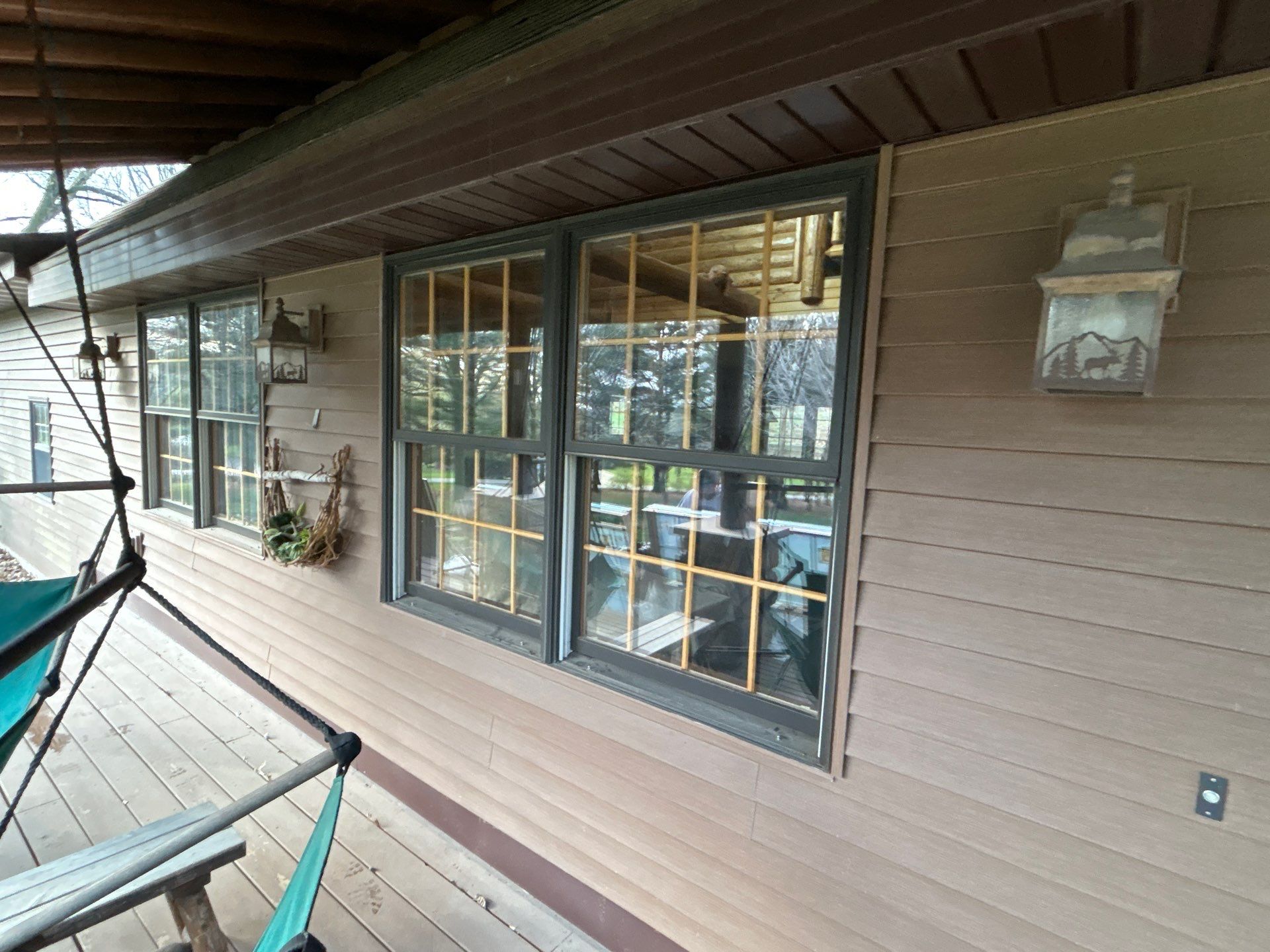 Pella Window installation using Pella Lifestyle wood/Aluminum window by United Windows and Siding LLC