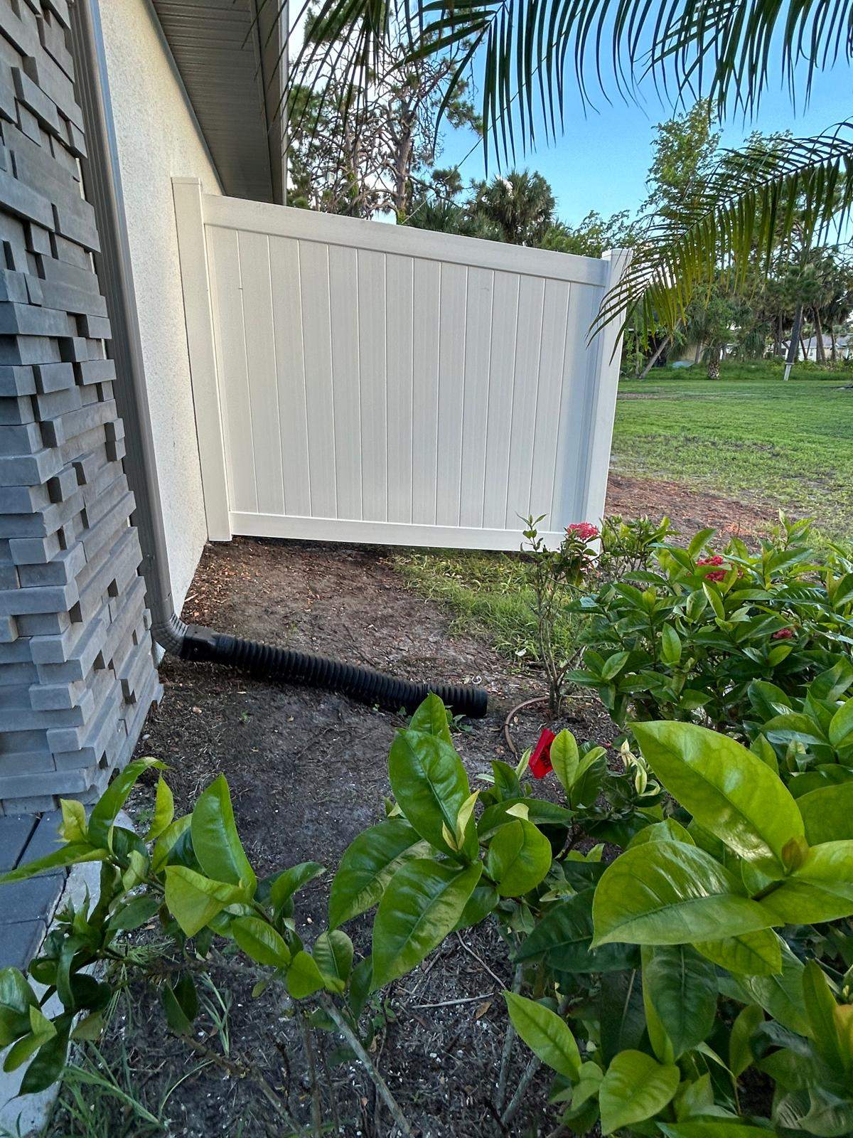 White Vinyl Privacy Fence and Chain Link Installation in North Port by True Fence LLC