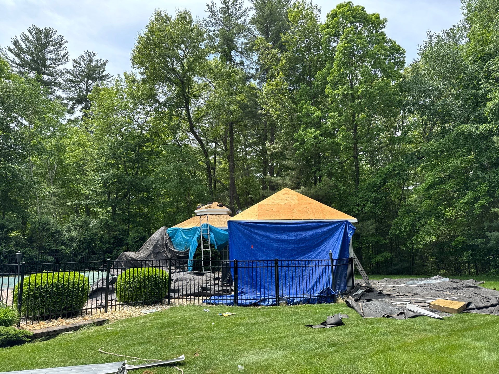 Roof Replacement on Cobbetts Pond in Windham, NH with Owens Corning Onyx Black Shingles by Compass exteriors