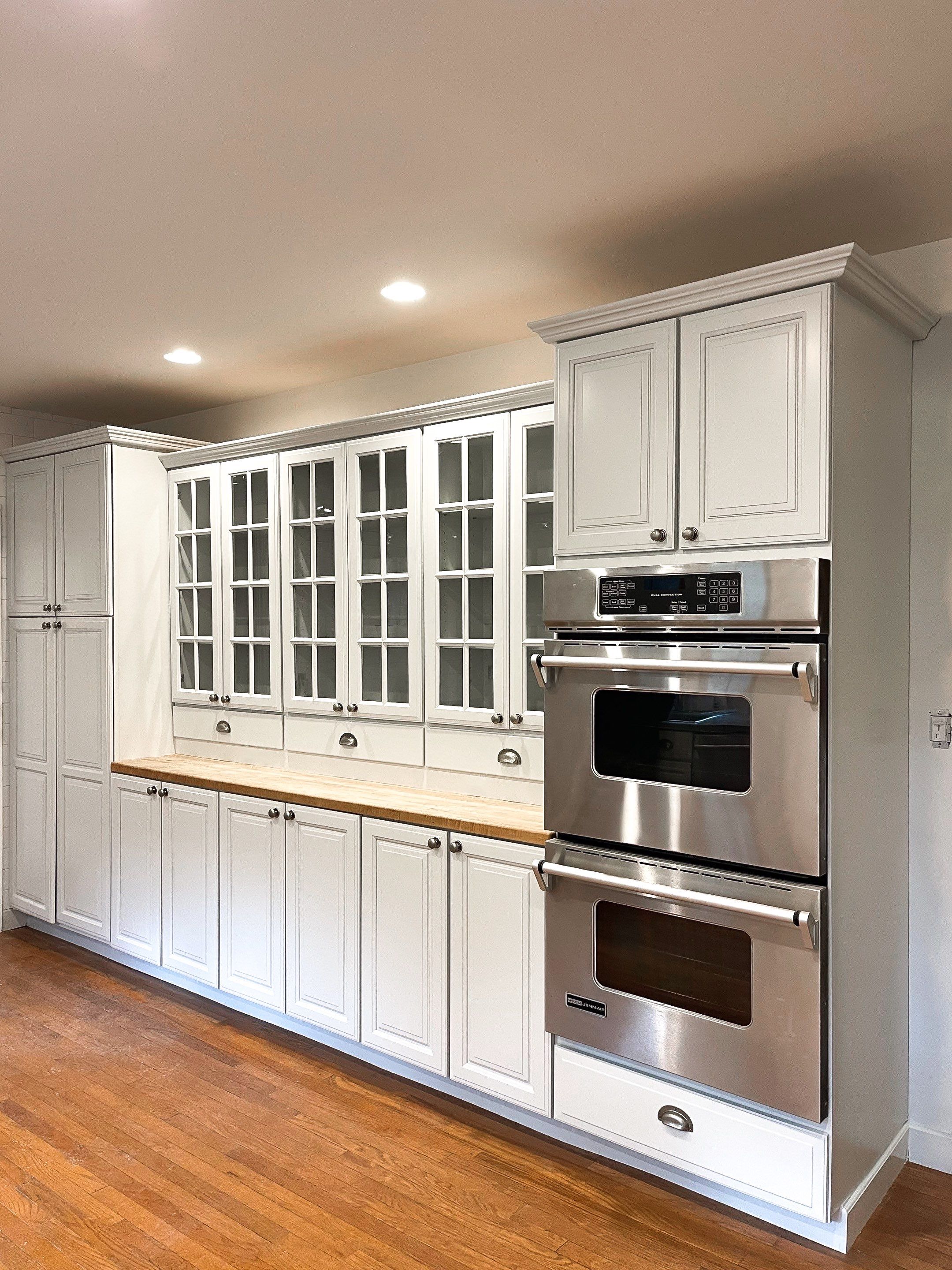 Kitchen Cabinet Painting using Milesi 2k by Trendy Walls Inc.