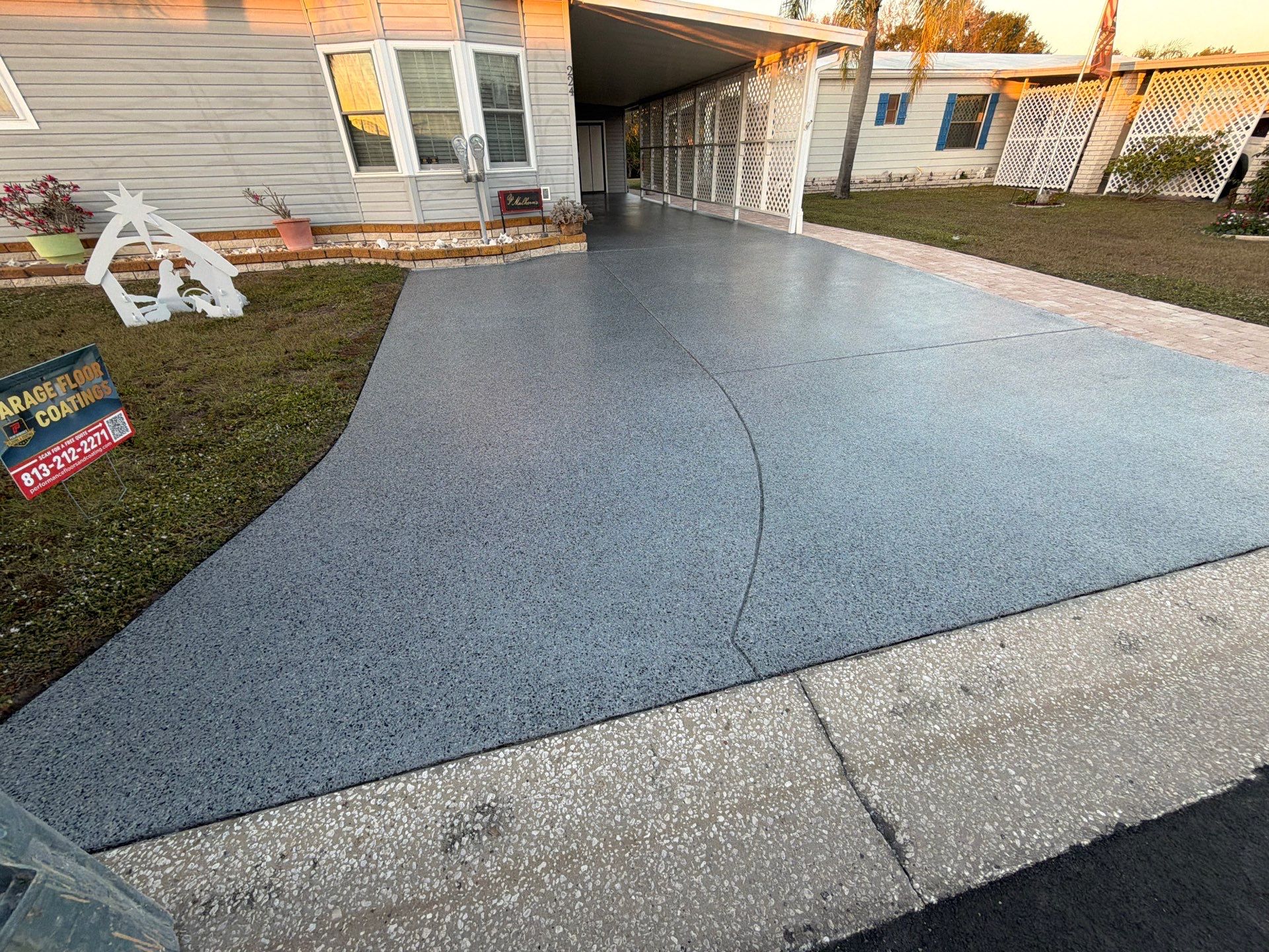 Driveway Transformation: Nightfall Flake System with Full UV & Moisture Protection by Performance Floors & Coating