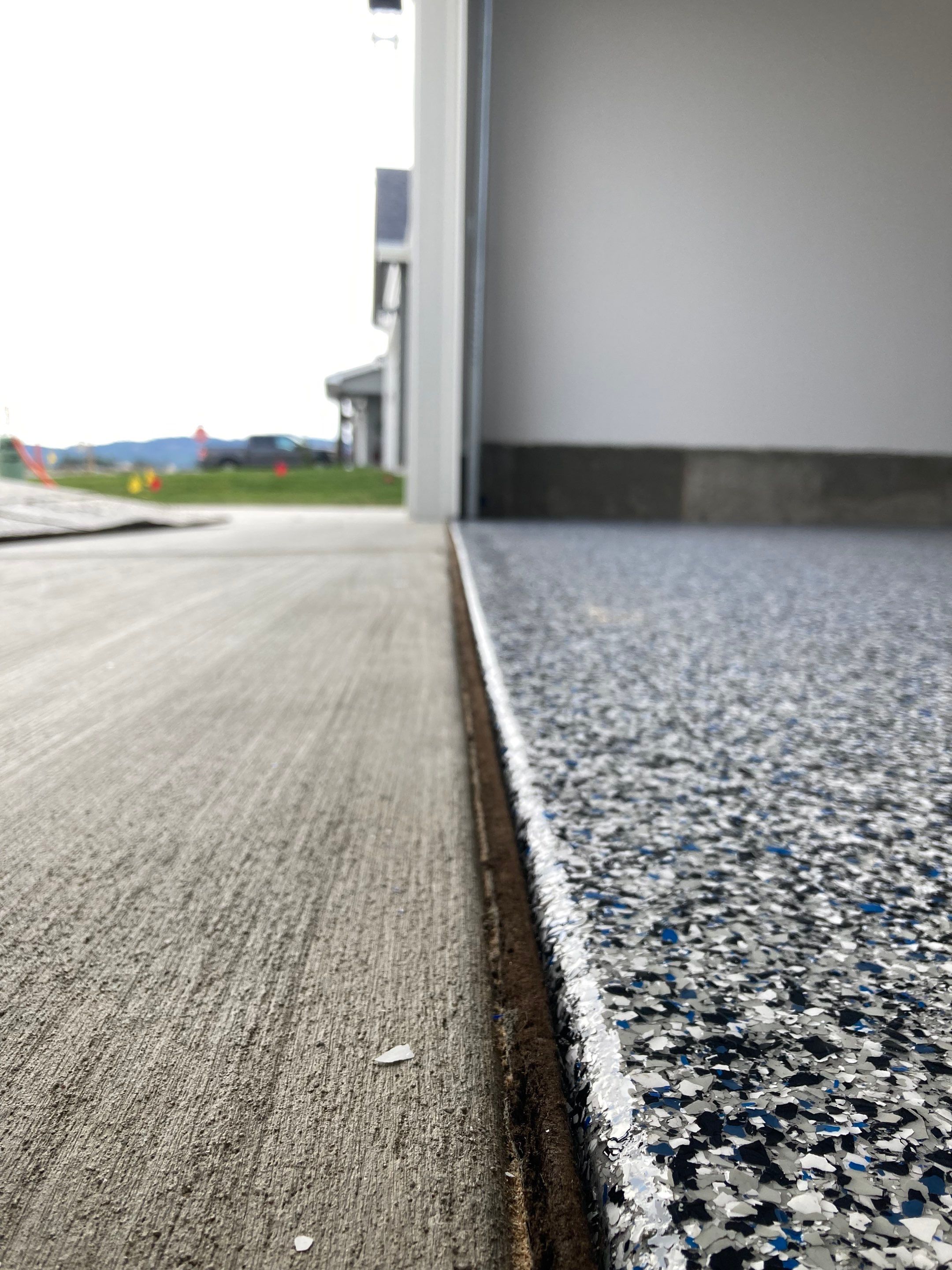 Garage Transformation using Domino with Blue by Croc Coatings, LLC