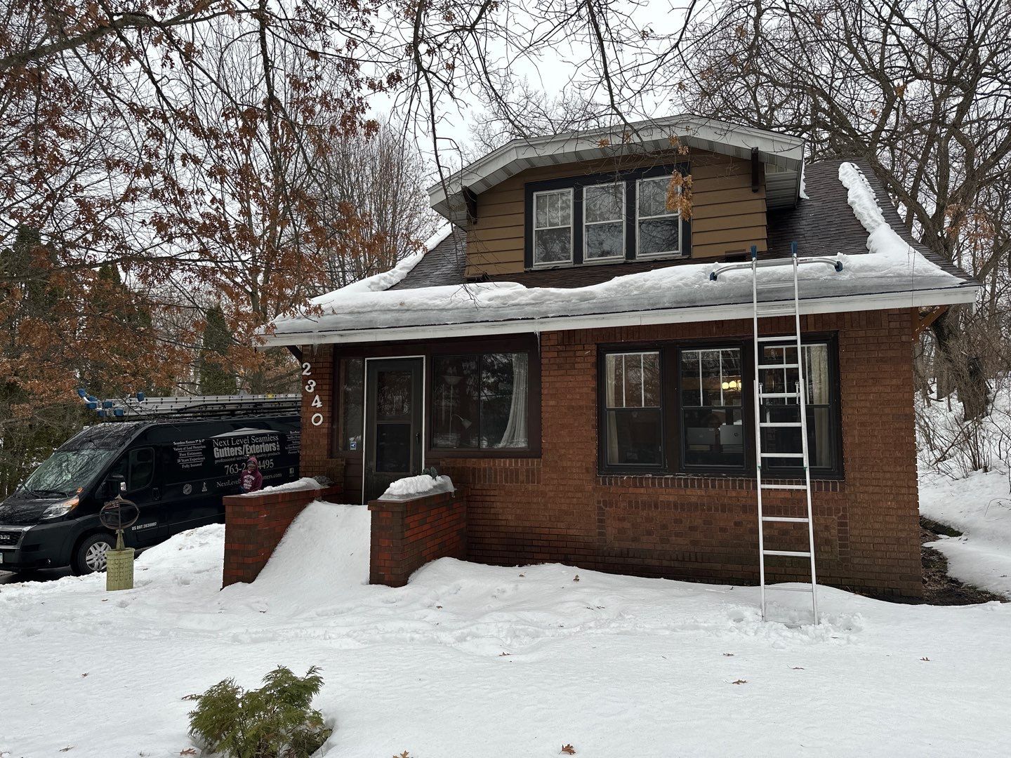 Ice Dam Removal by Next Level Seamless Gutters / Exteriors Inc.