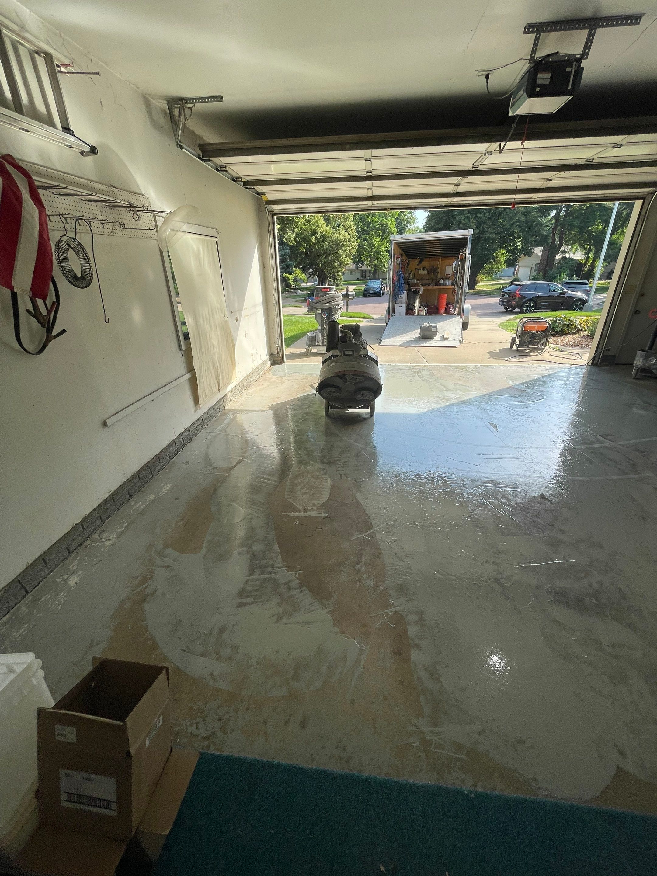 Custom Creekbed Garage Floor Coating in Sioux Falls by Select Painting, Coatings & Garage Cabinets