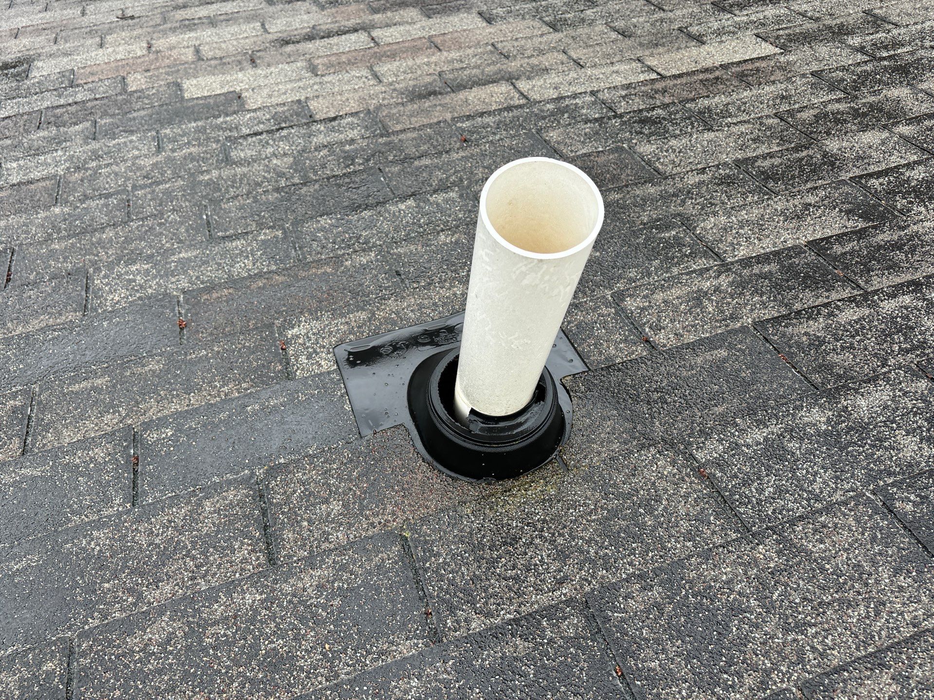 Installing new Roof and Gutter Protection after Hail Damage by Acme Exteriors