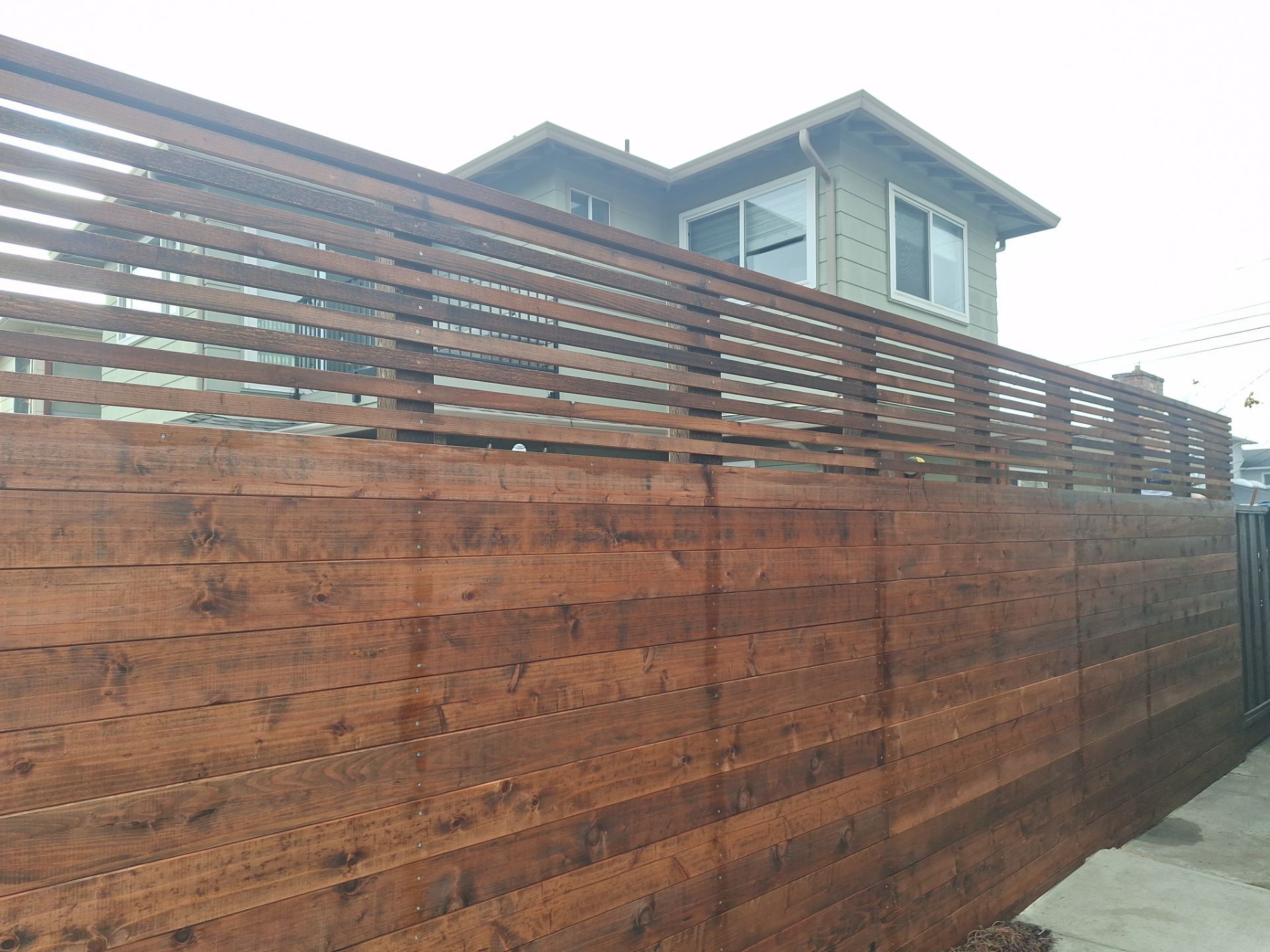 Horizontal T&G with Horizontal 1x2 Lattice by Fremont Fence Inc