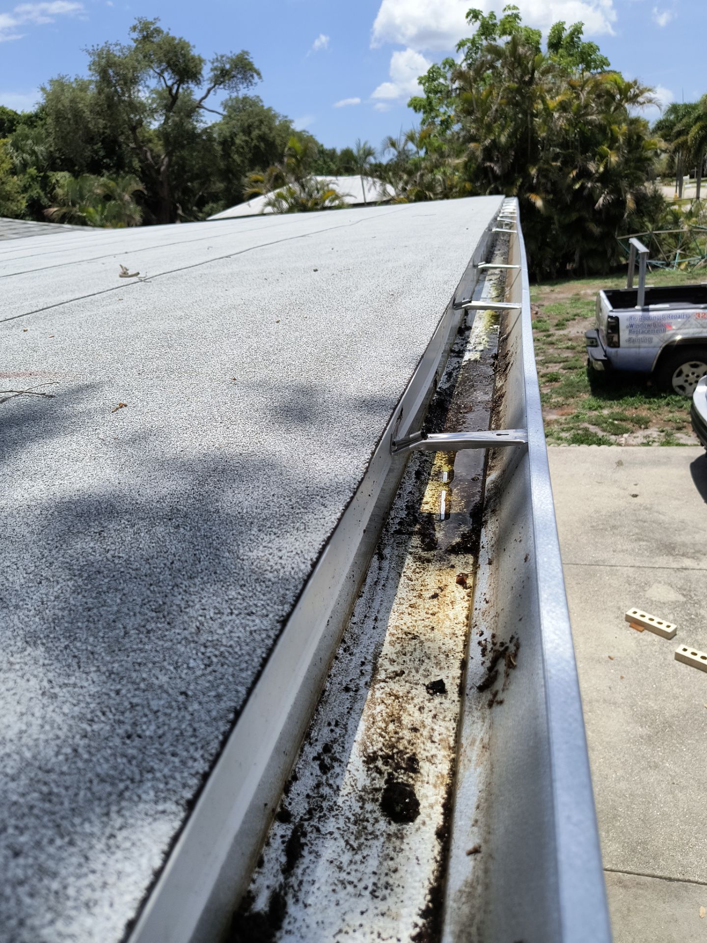 Seamless Galvalume Gutters Installation using Galvanized Gutters in Fort Myers FL by Gutter Professors