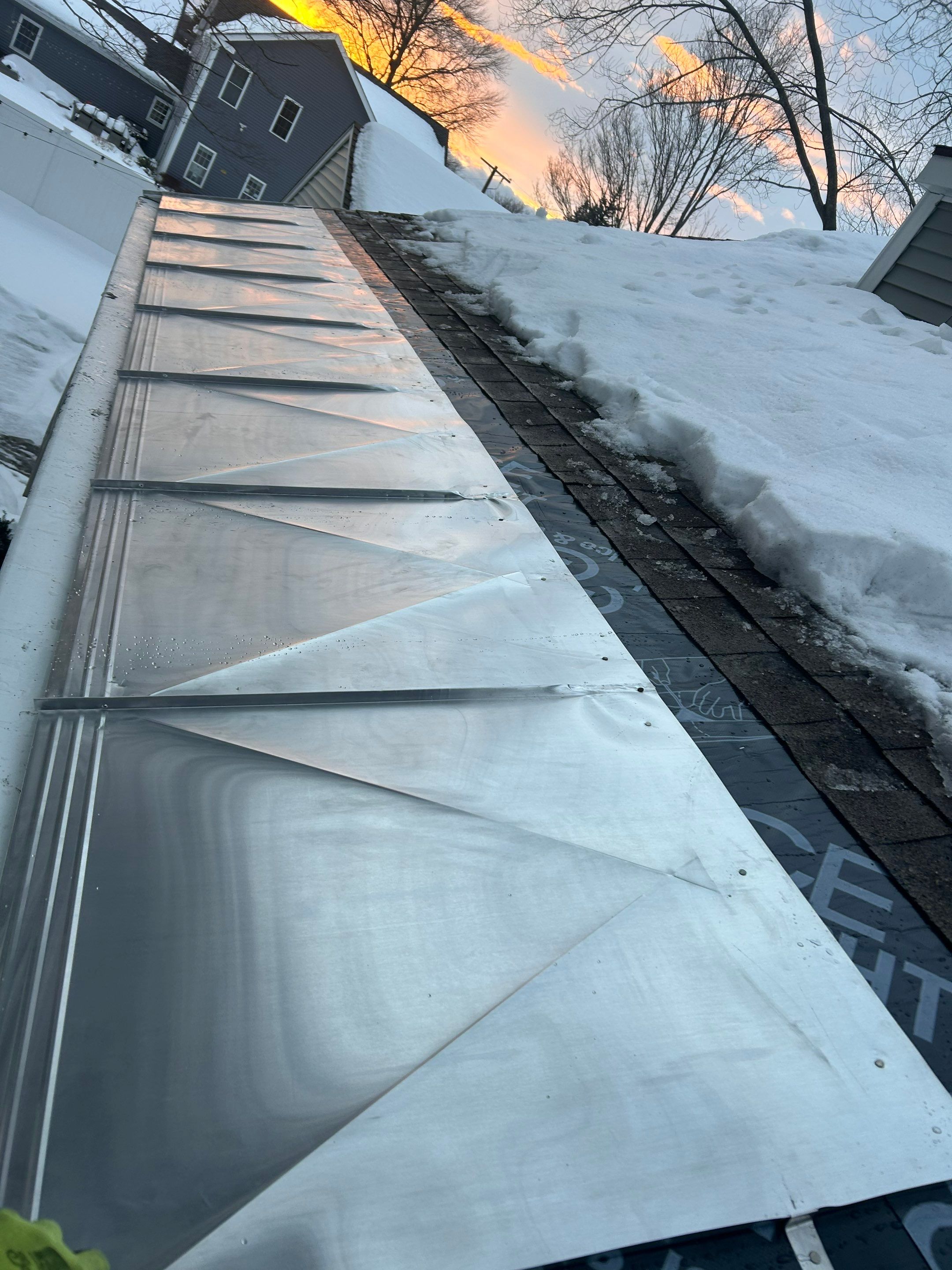 Snow/Ice Belt & Ice Dam Removal Project in Woburn by Mighty Dog Roofing of Greater Middlesex County