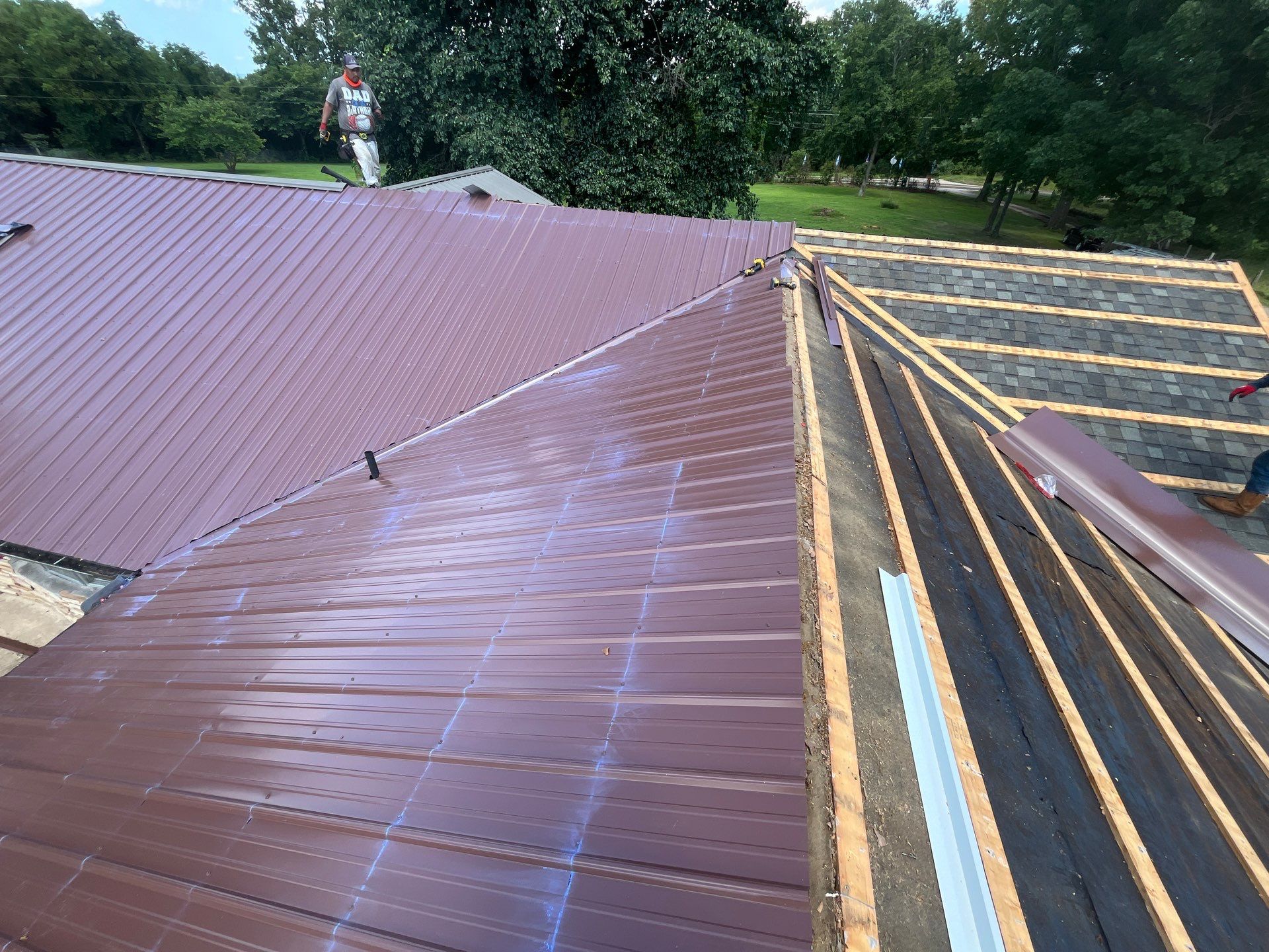 Residential Roofing Install - 29 Gauge G-Rib Metal - Color Brown & Crimson Red by Titan Commercial & Residential Roofing 