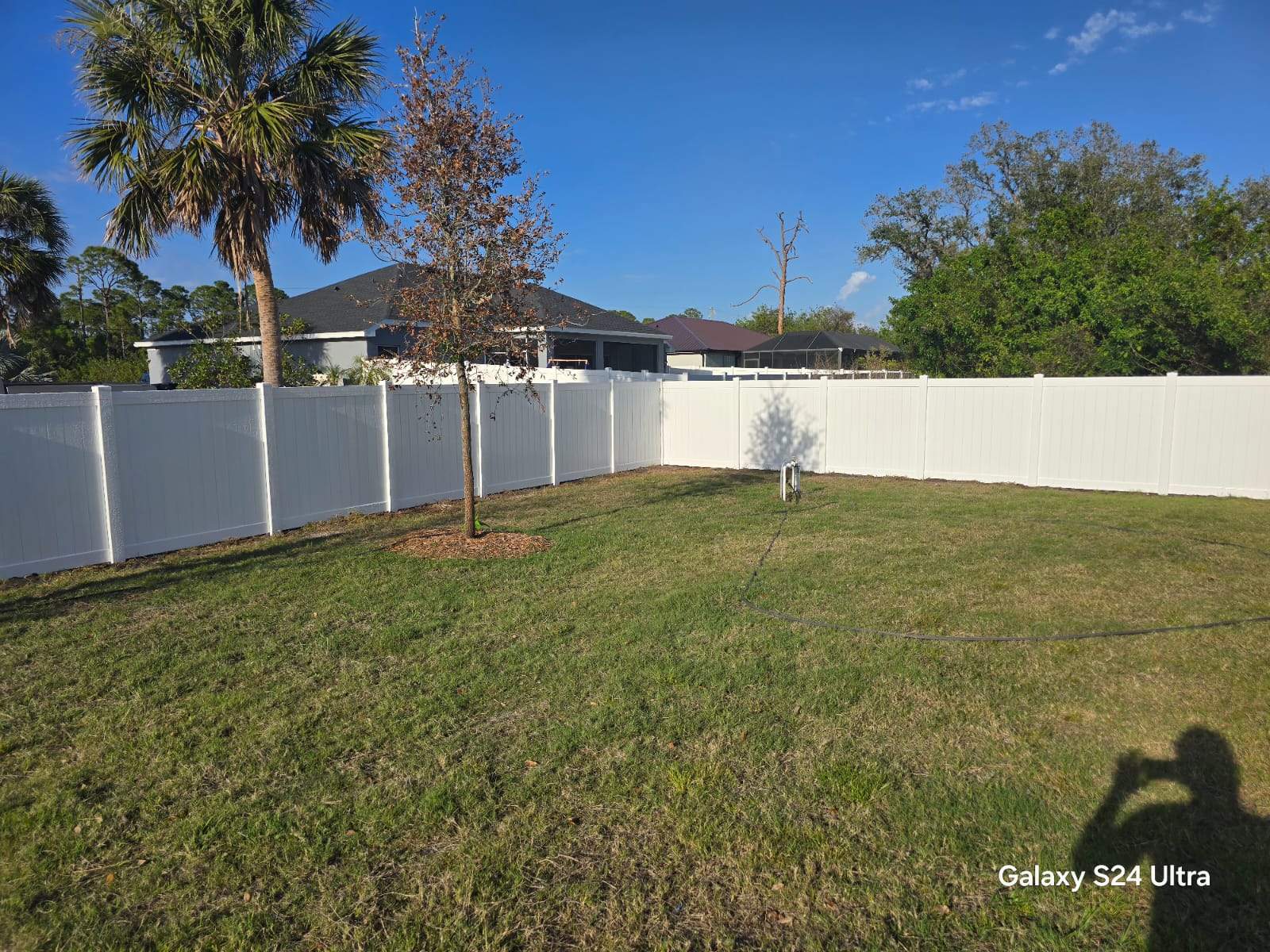 Residential White Vinyl Privacy Fence Installation in North Port by True Fence LLC