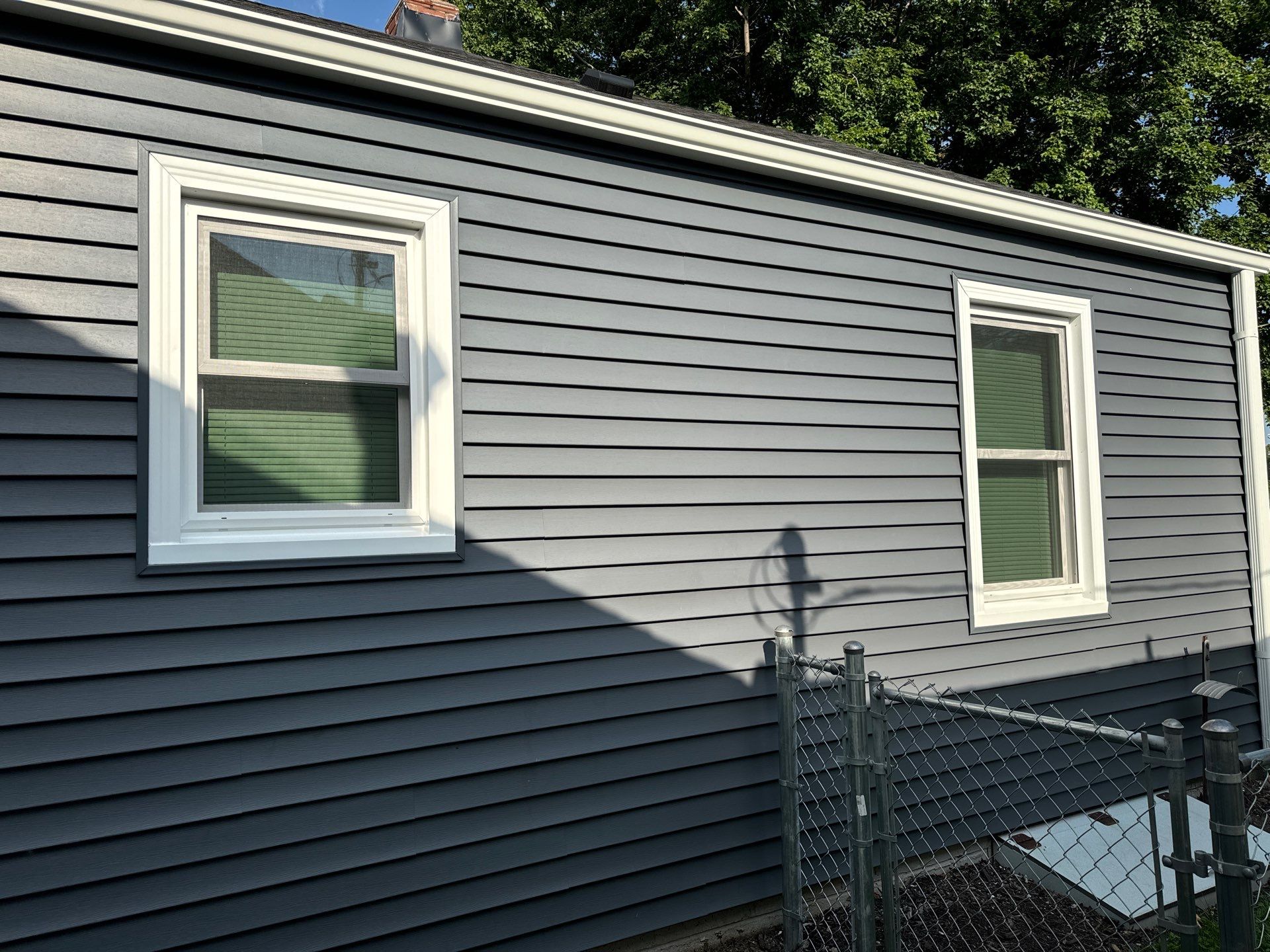 NKC Happy Blues by EEC Windows, Siding & Roofing