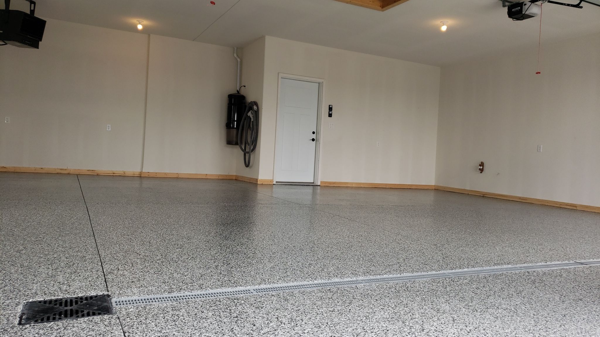 Beautiful Garage Upgrade by Revival Concrete Coatings, LLC