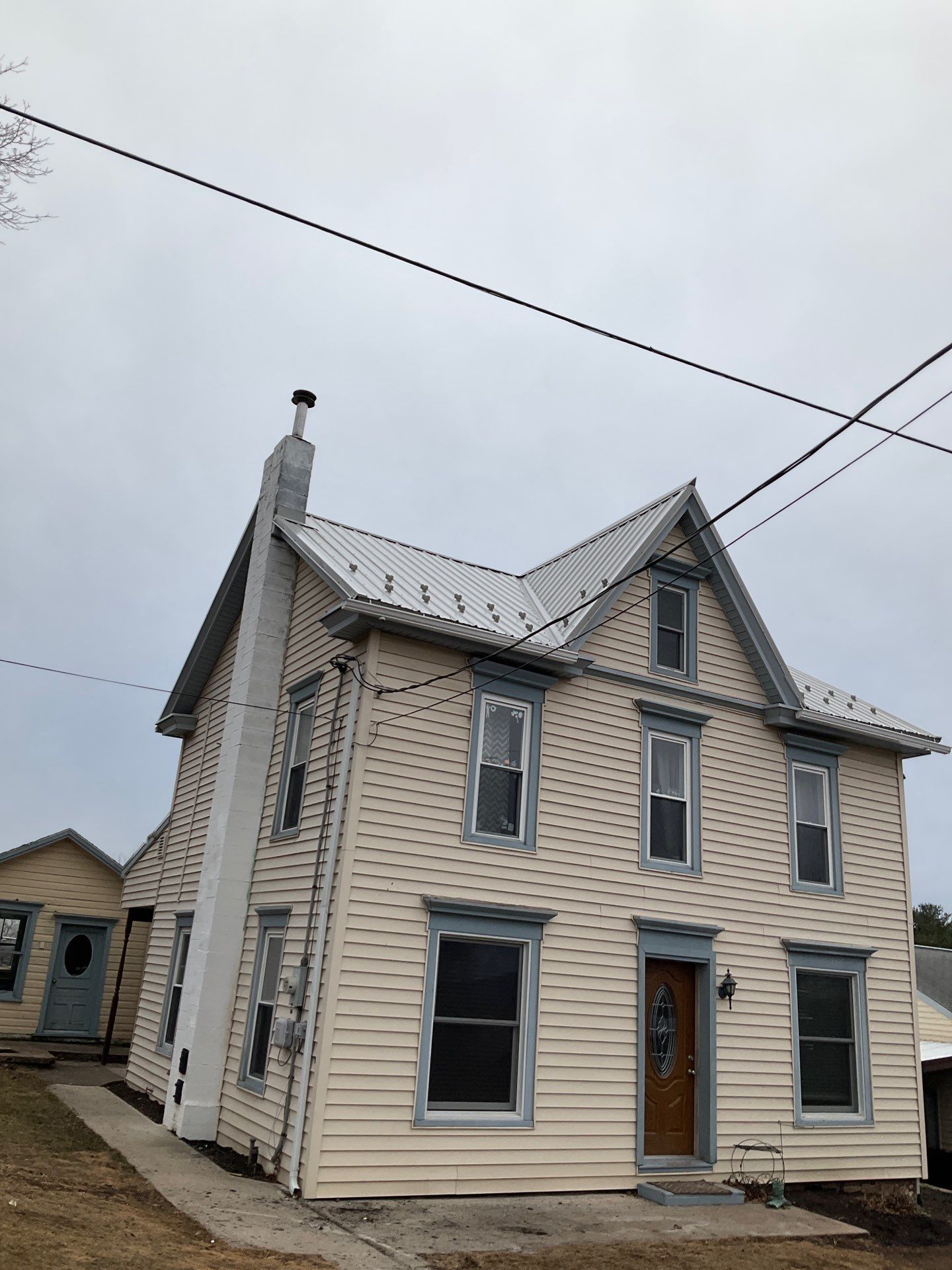 ABM Metal Roof Replacement - Ash Gray by Esh Builders