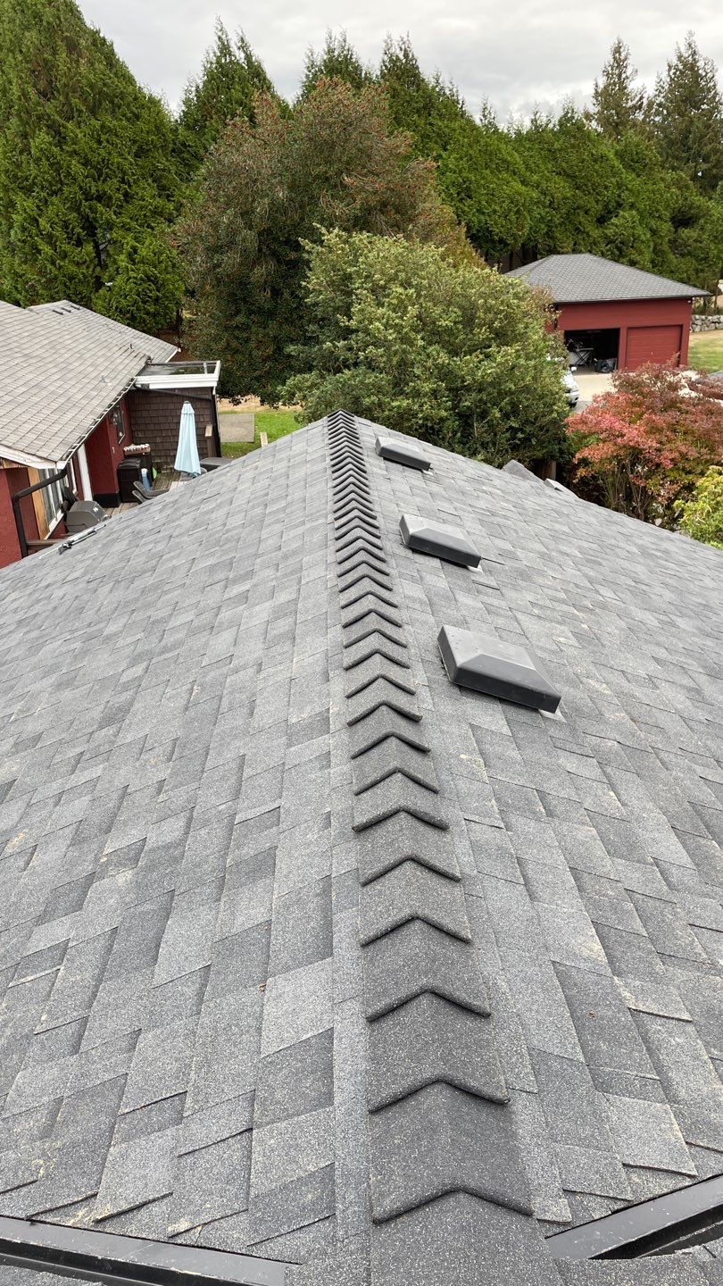 Residential Roofing Installation using Malarky Vista Midnight black by Top Notch Roofing Inc