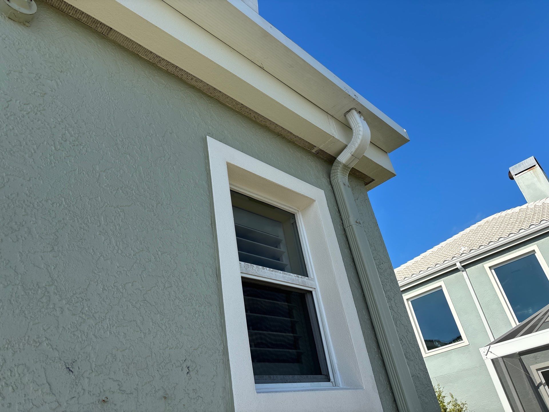 Splash Guard Gutters for Coastal Homes in Longboat Key FL by Gutter Professors