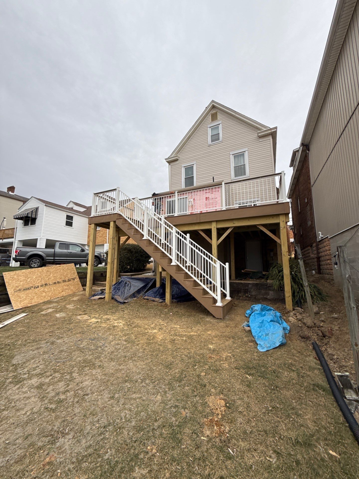 Deck and door by Cousins Roofing Siding & Decks