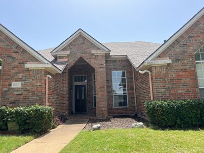 Red brick with IKO Cornerstone 