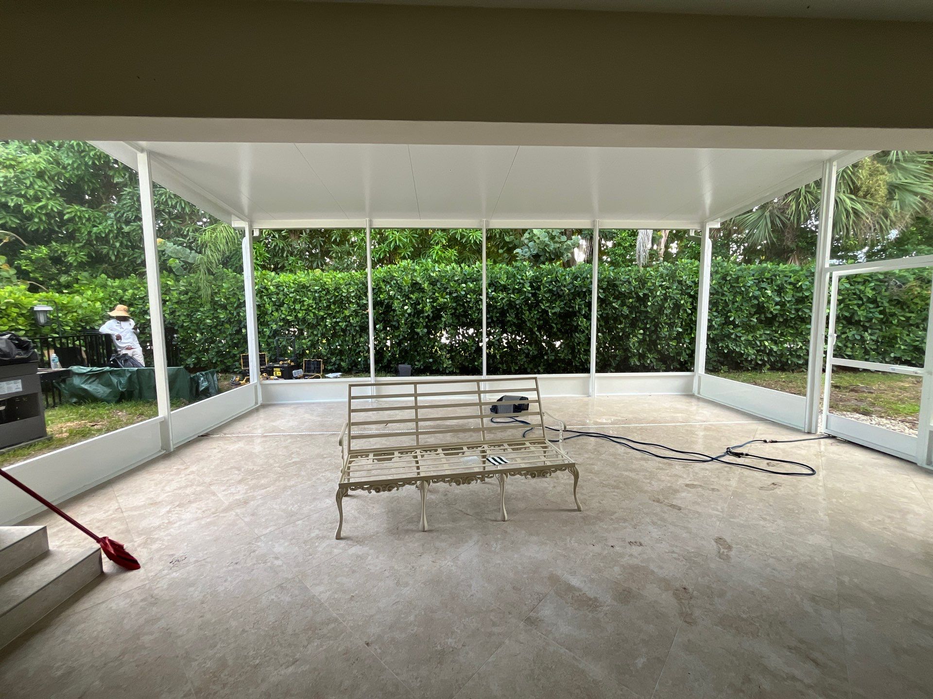 Aluminum Insulated Roof and Screen Enclosure Installation in Atlantis by The Screen Depot, Inc