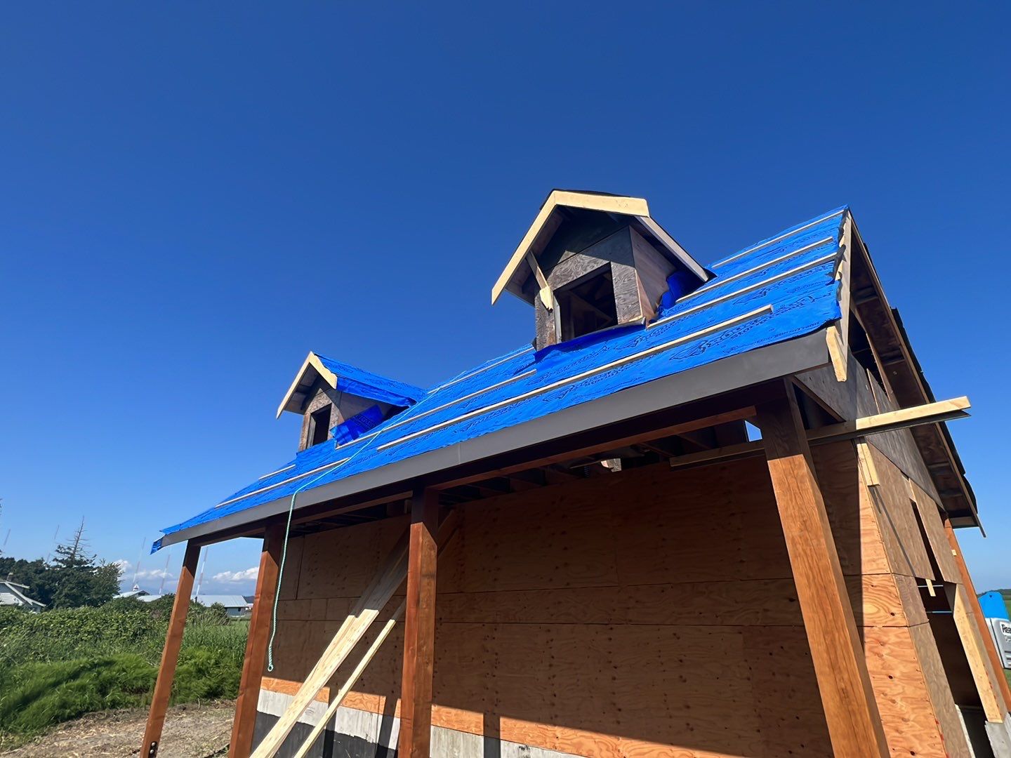 Agricultural Roofing Installation using 12" Prolok metal  by Top Notch Roofing Inc