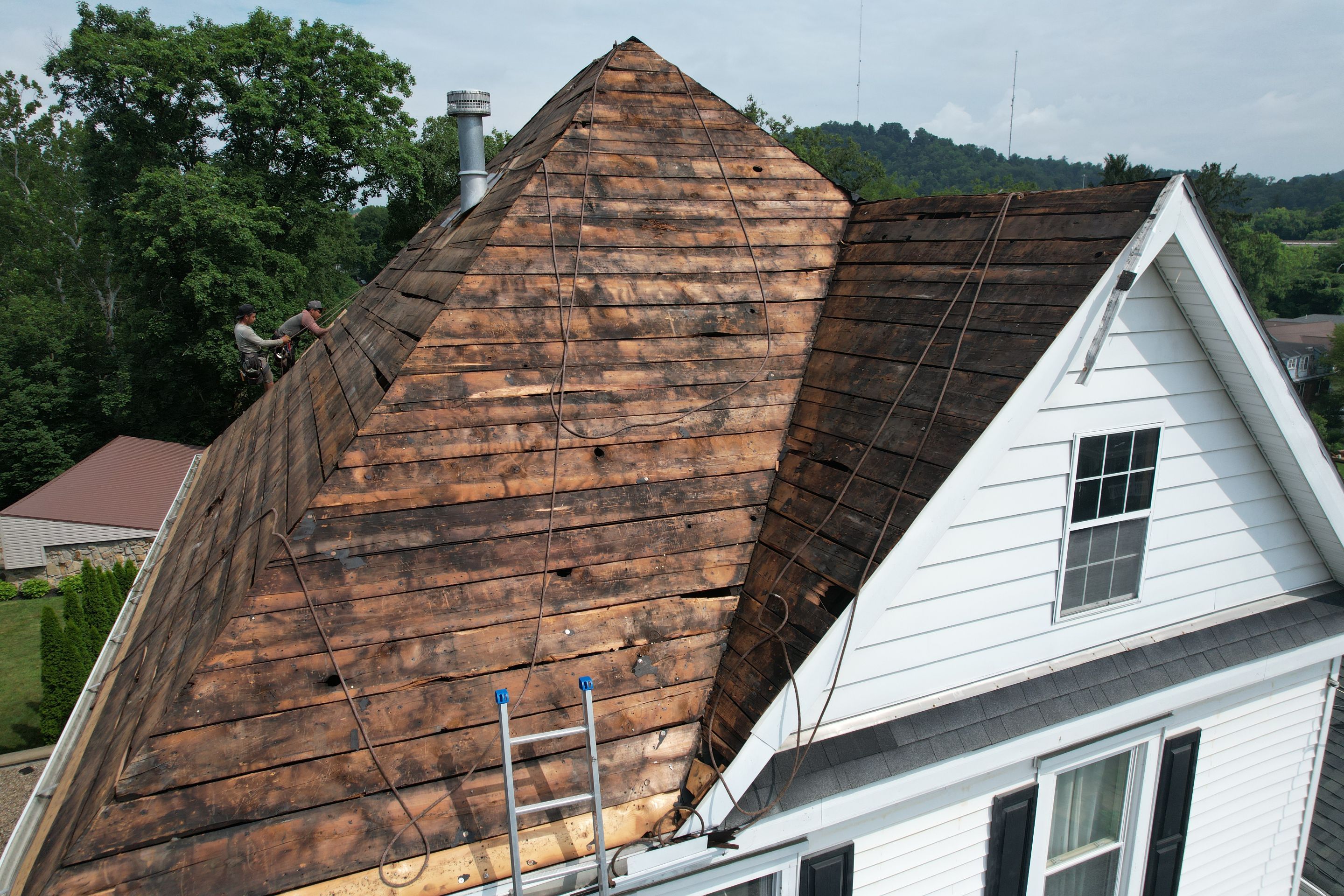Residential Roofing Installation using GAF Timberline HDZ Charcoal by Rainstoppers Roofing