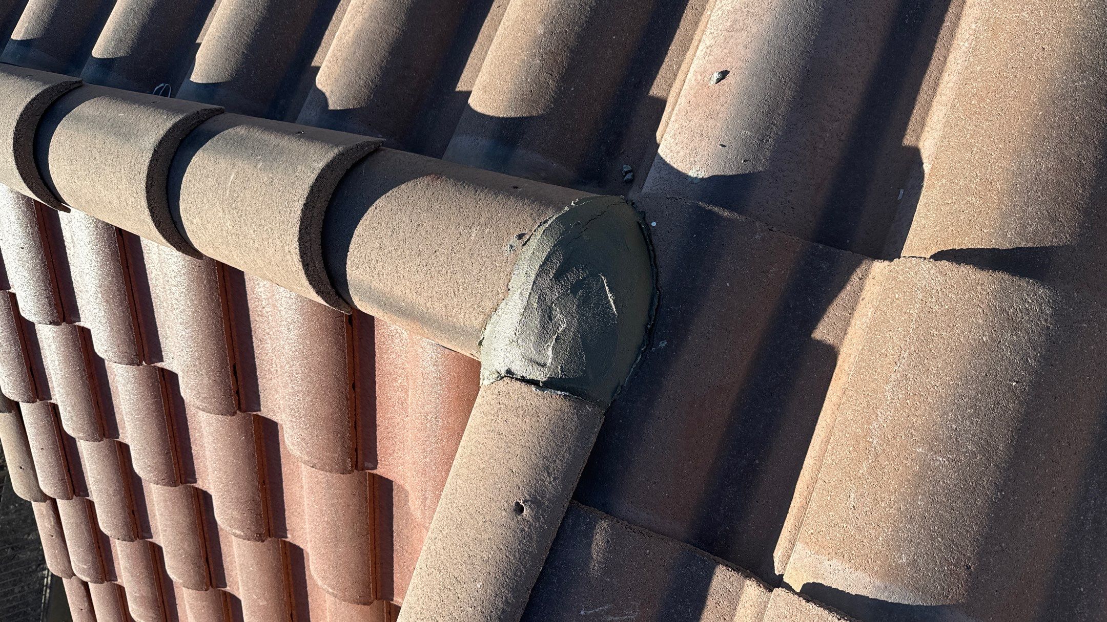 Residential Roofing Installation using Clay Tile by Weather-Tite Exteriors LLC