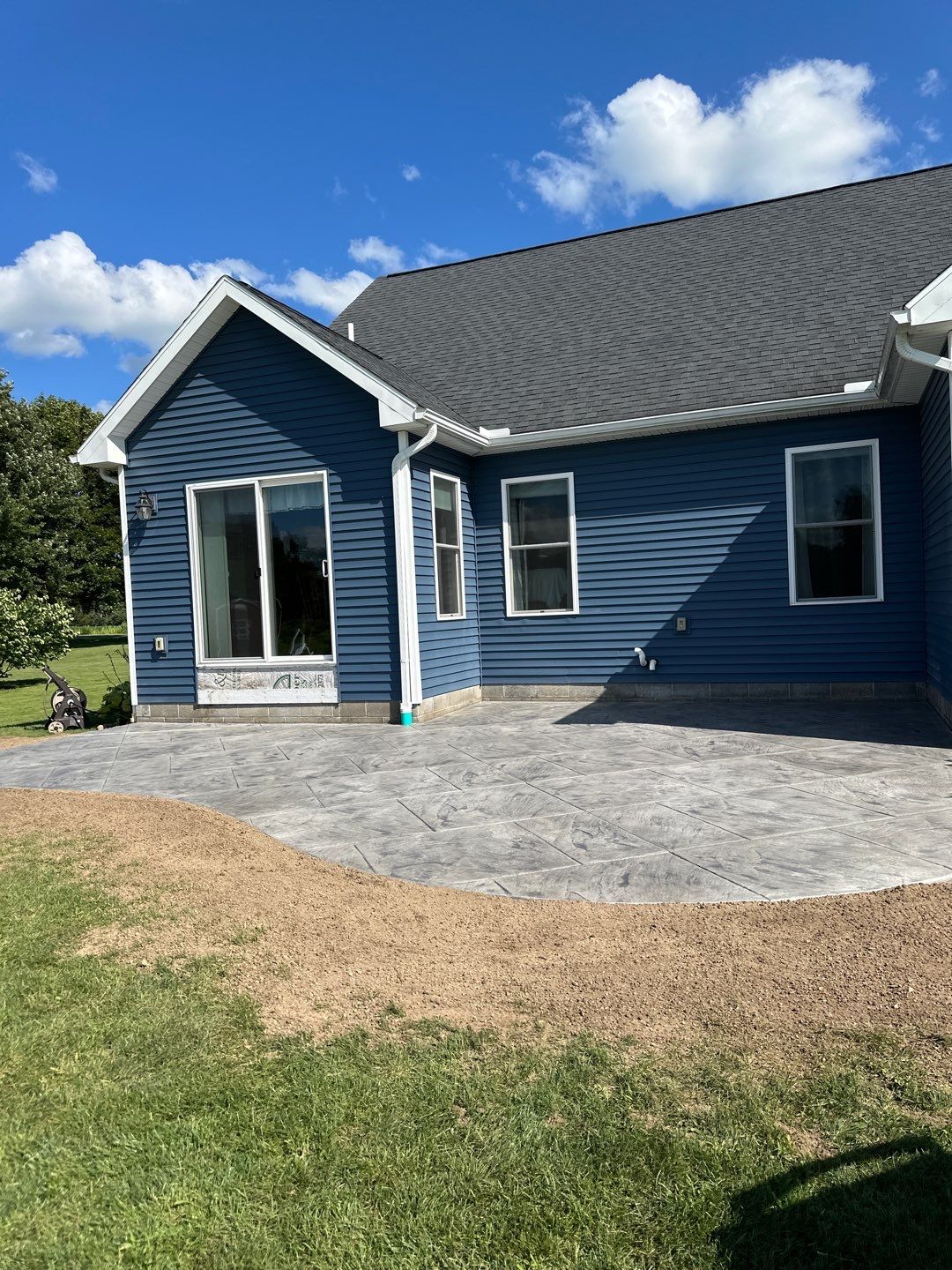 Slate stamped concrete patio  by NG Masonry & Construction LLC