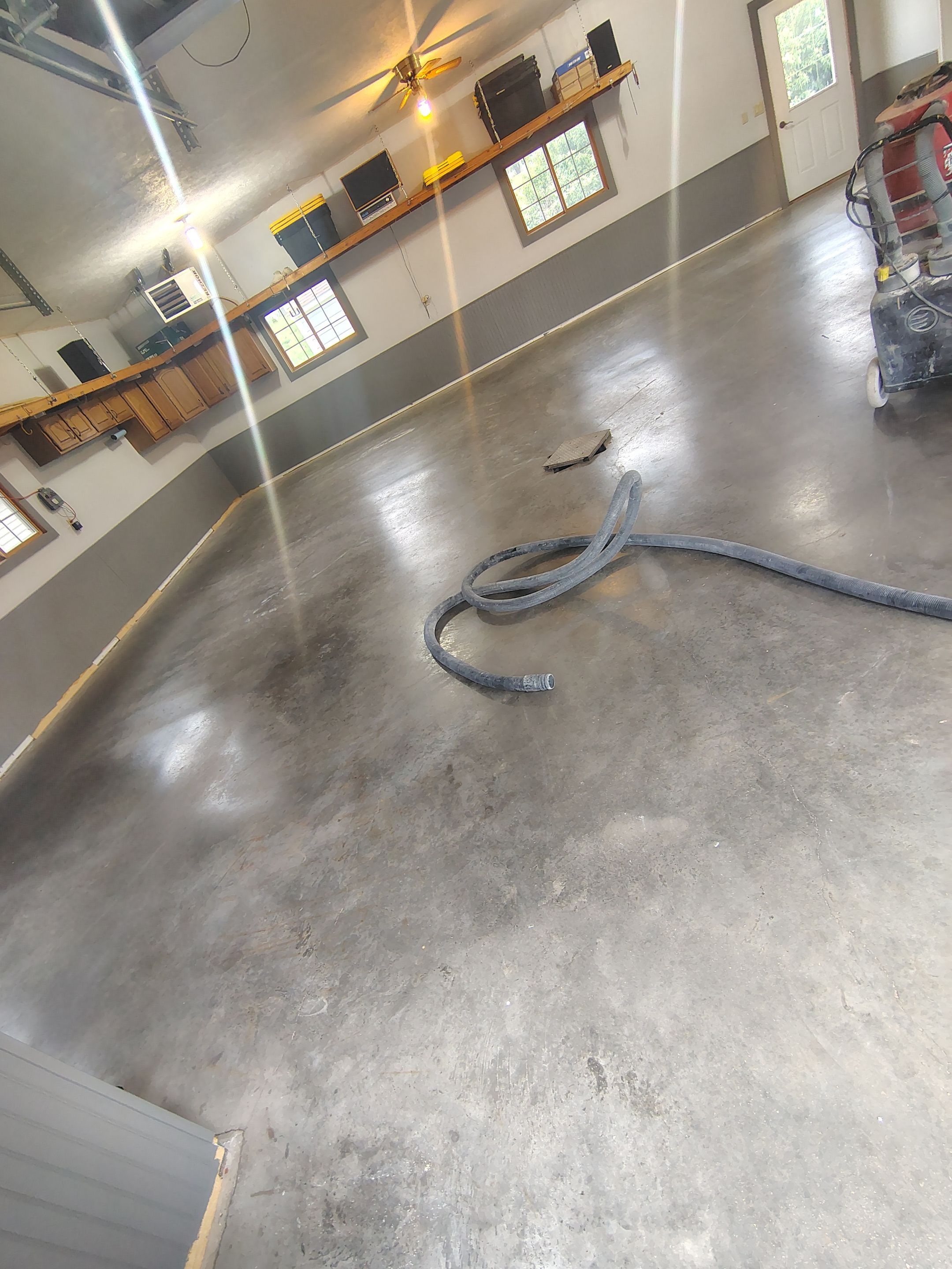 Multi-Fleck Epoxy Garage Floor Coating in Dell Rapids by Select Painting, Coatings & Garage Cabinets