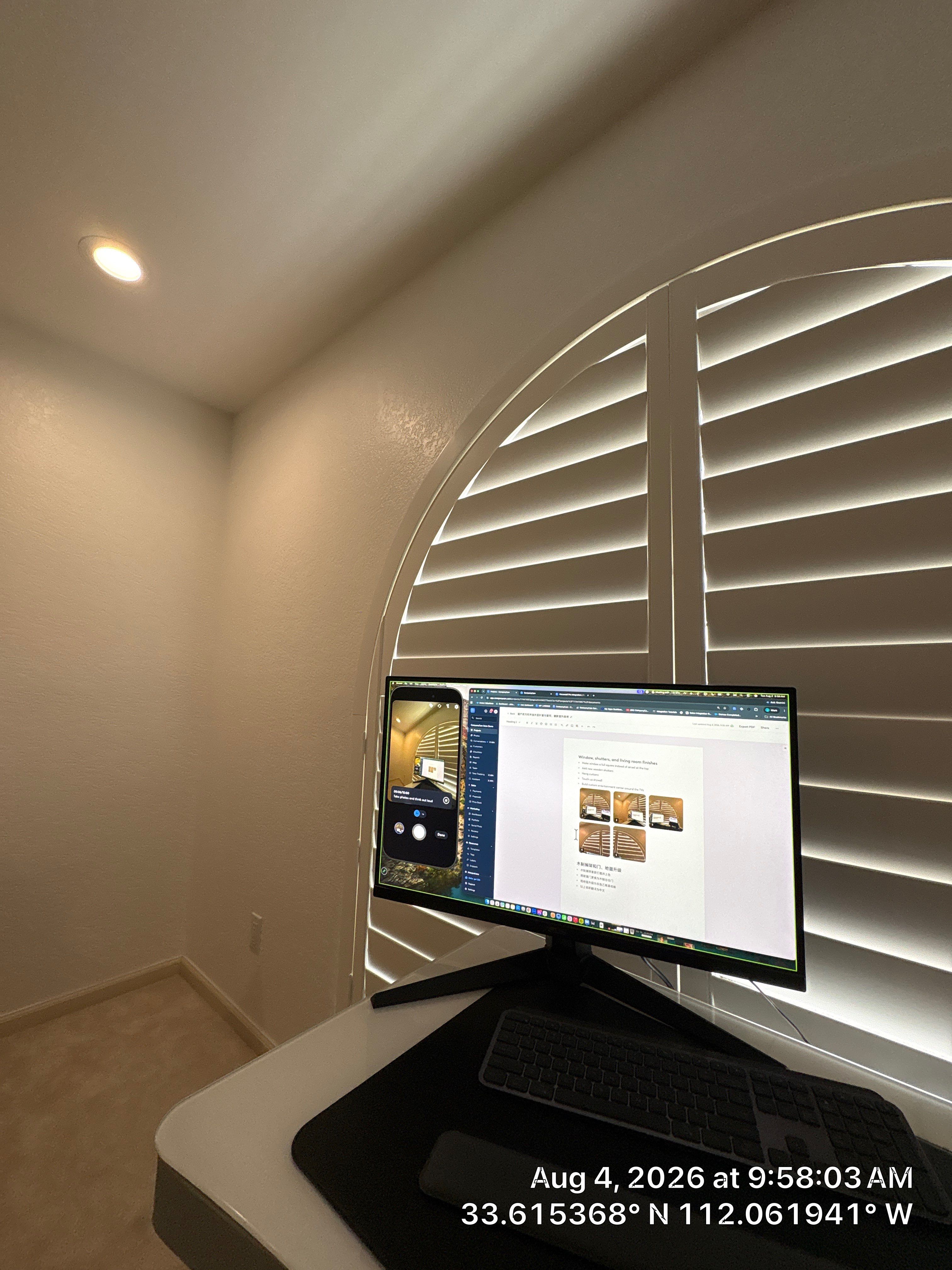 Custom Home Office Setup Featuring Arched Plantation Shutters and Accent Wall by CompanyCam Sales Demo