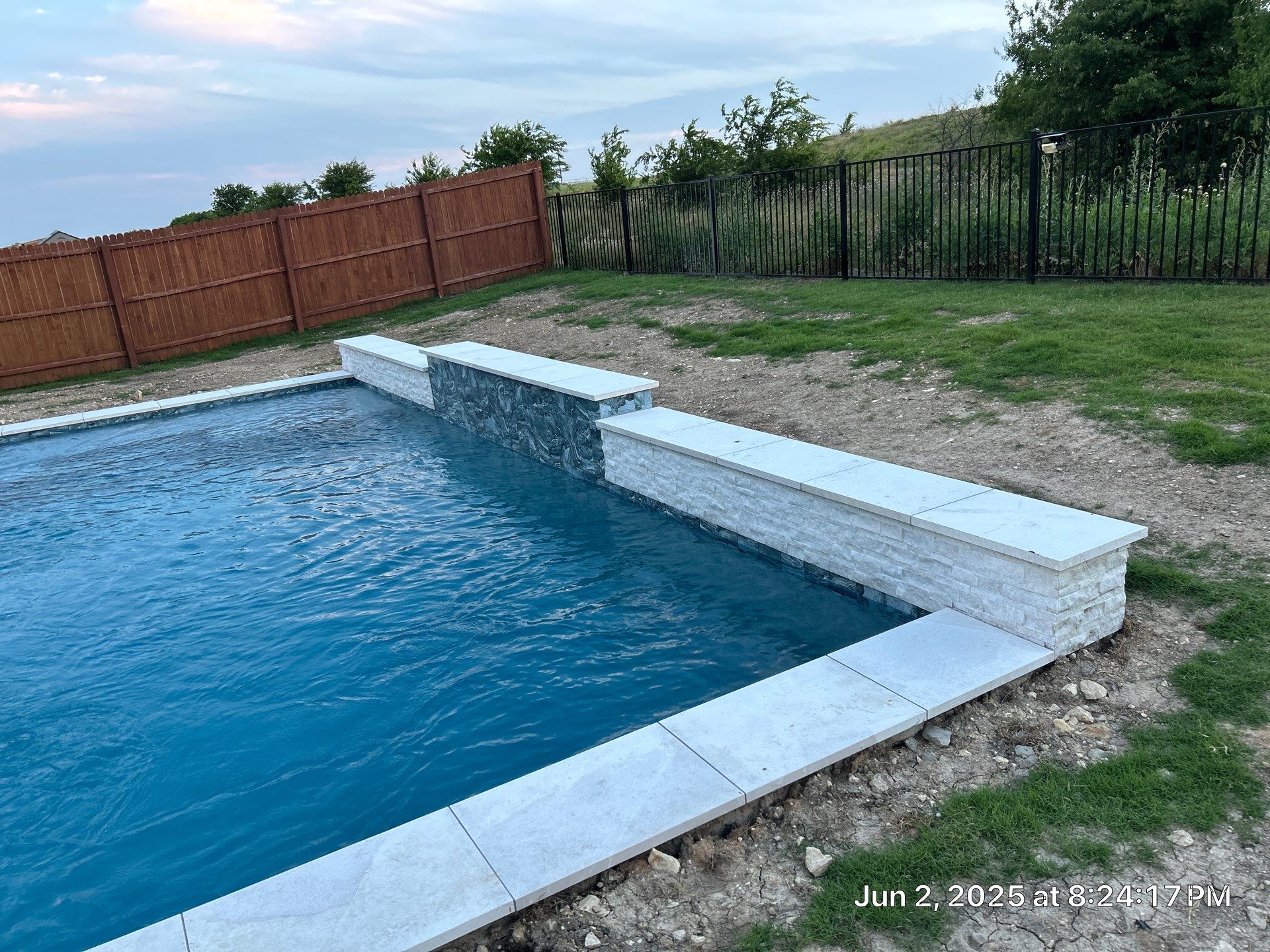Sleek Geometric Pool with Crisp White Decking by Pinnacle Pools and Spas - DFW