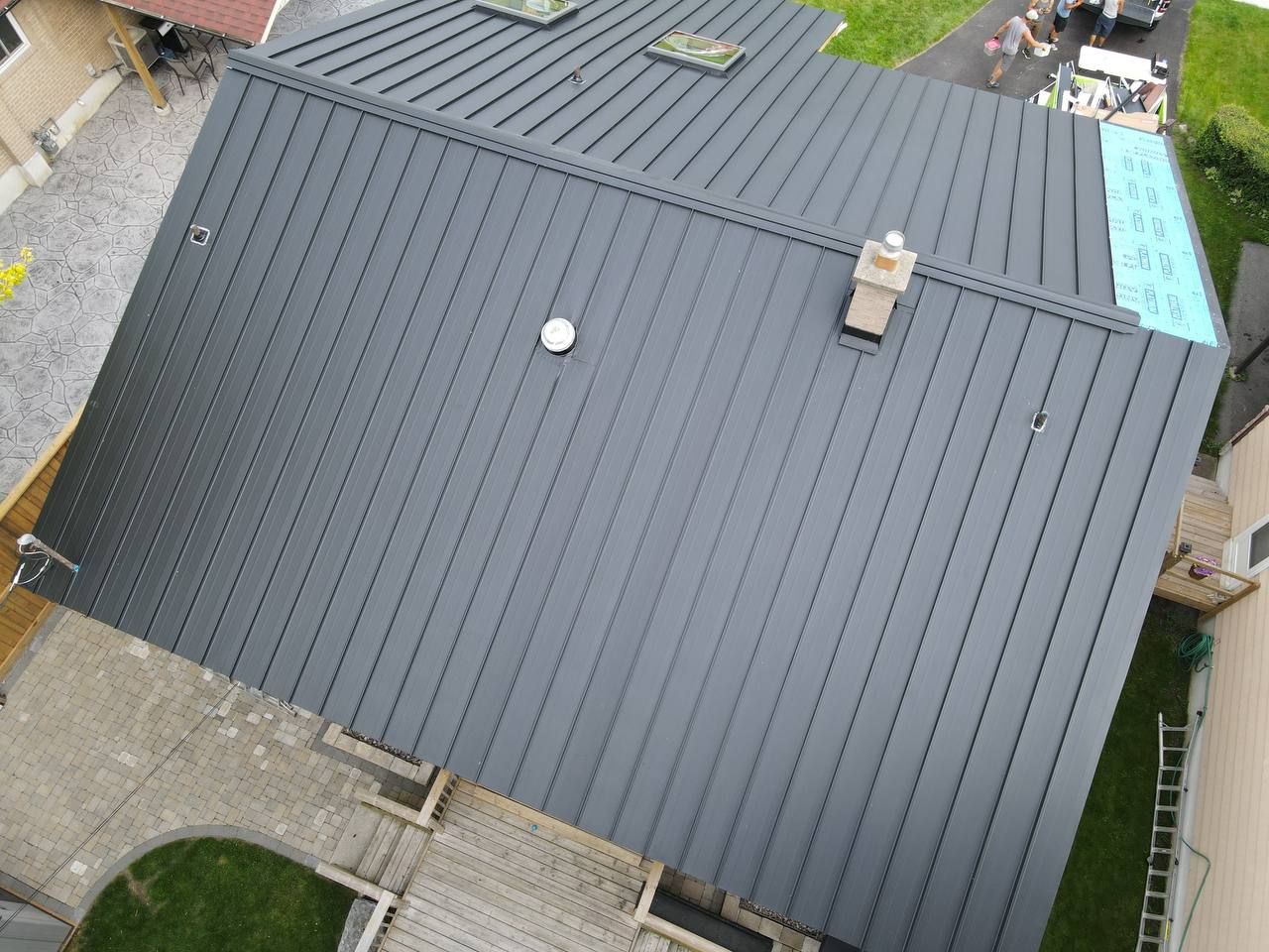 Residential Roofing Installation using 16" Standing Seam Panels by Jay Carter Roofing & Sheet Metal