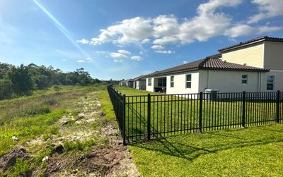 Aluminum Fence Installation using Black 3 Rail Aluminum Fence