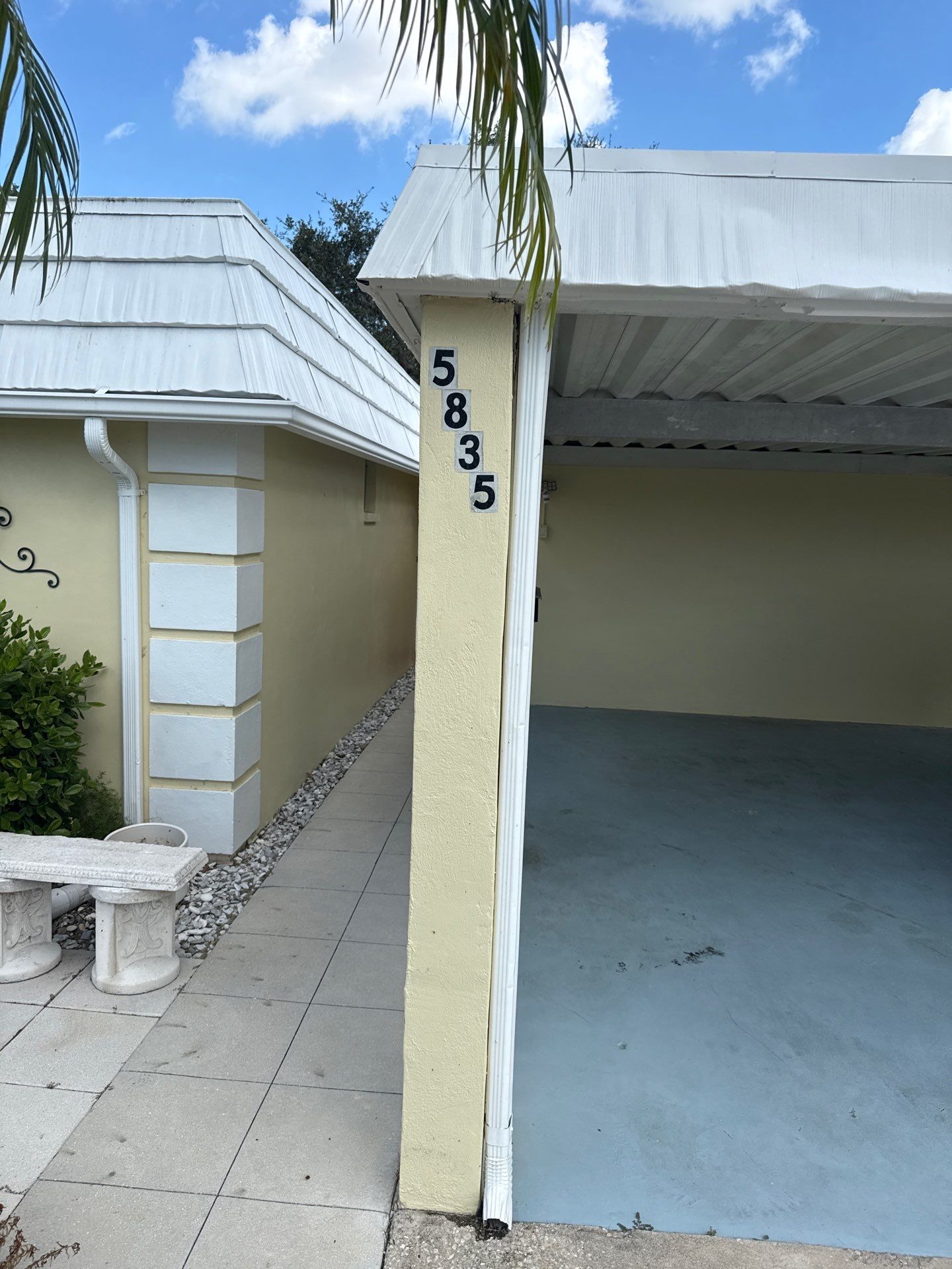 White Gutters and Matching Downspouts in Sarasota FL by Gutter Professors