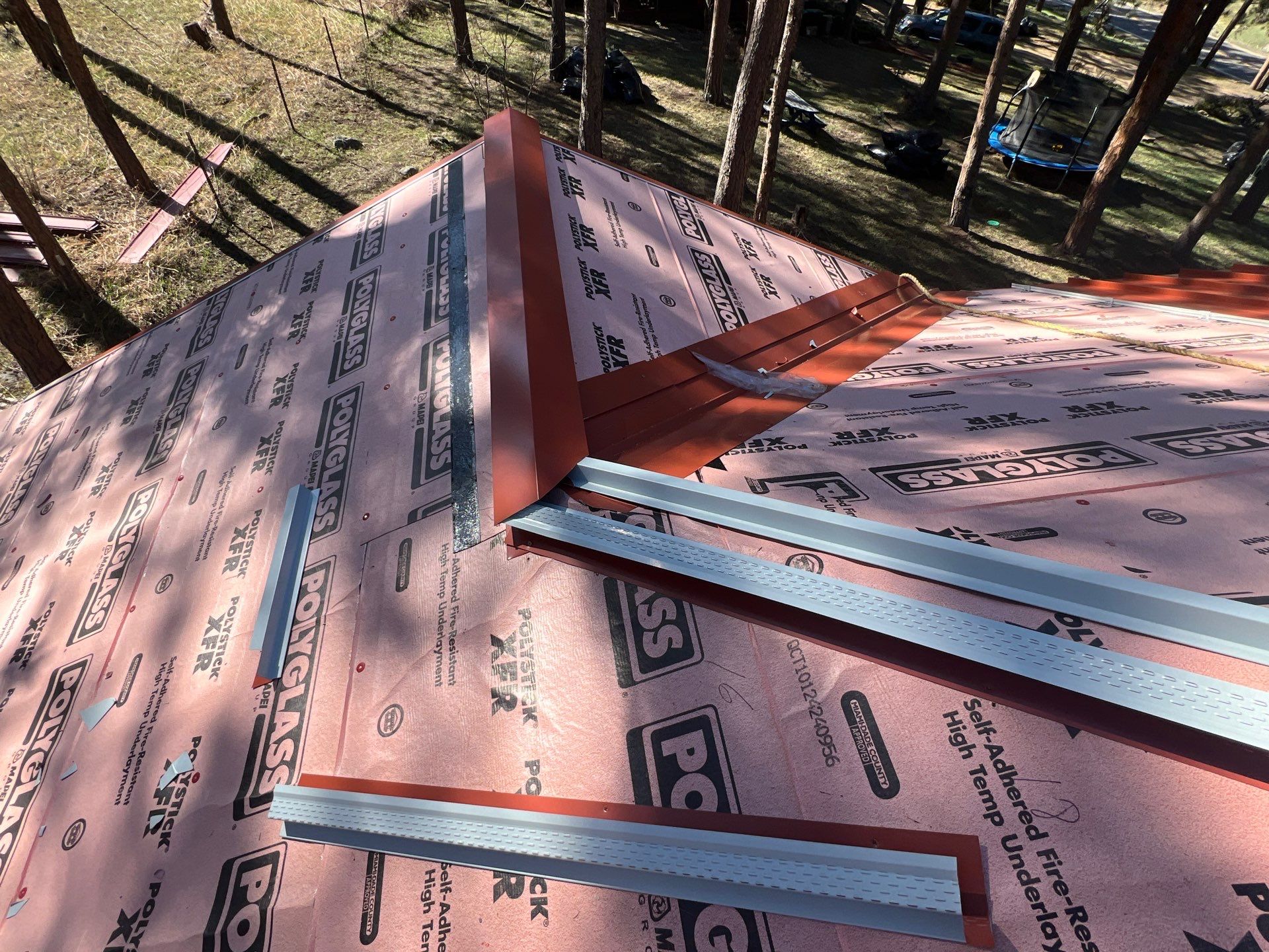 Residential Roofing Installation using Standing Seam Metal by Blue Peaks Roofing LLC 