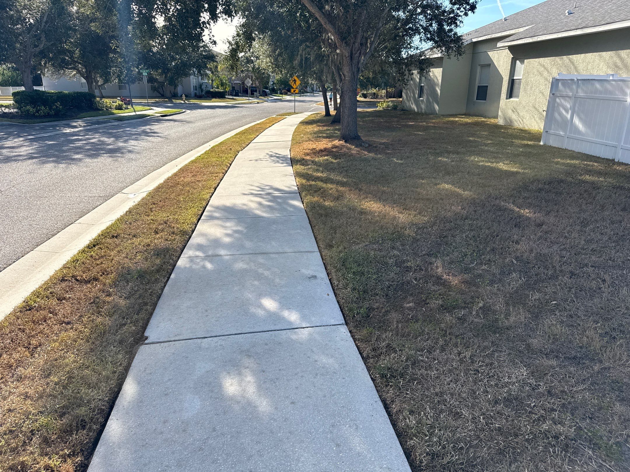 Driveway & Sidewalk Cleaning Transformation | Kingsfield Lakes, Parrish FL by Sunshine AquaWash