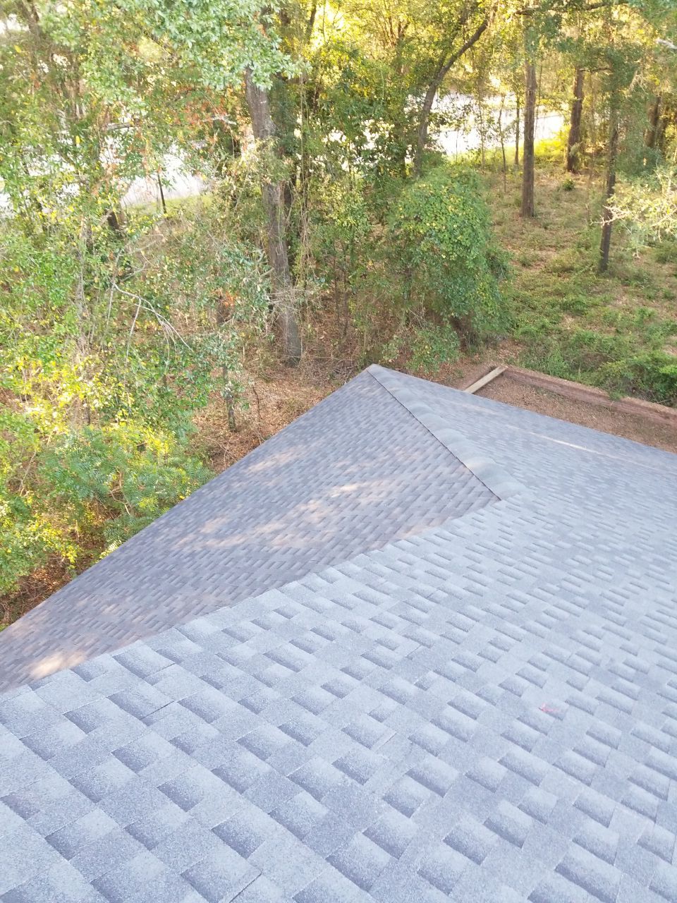 Residential Roofing Installation using Roof Replacement by American Roofing & Construction LLC